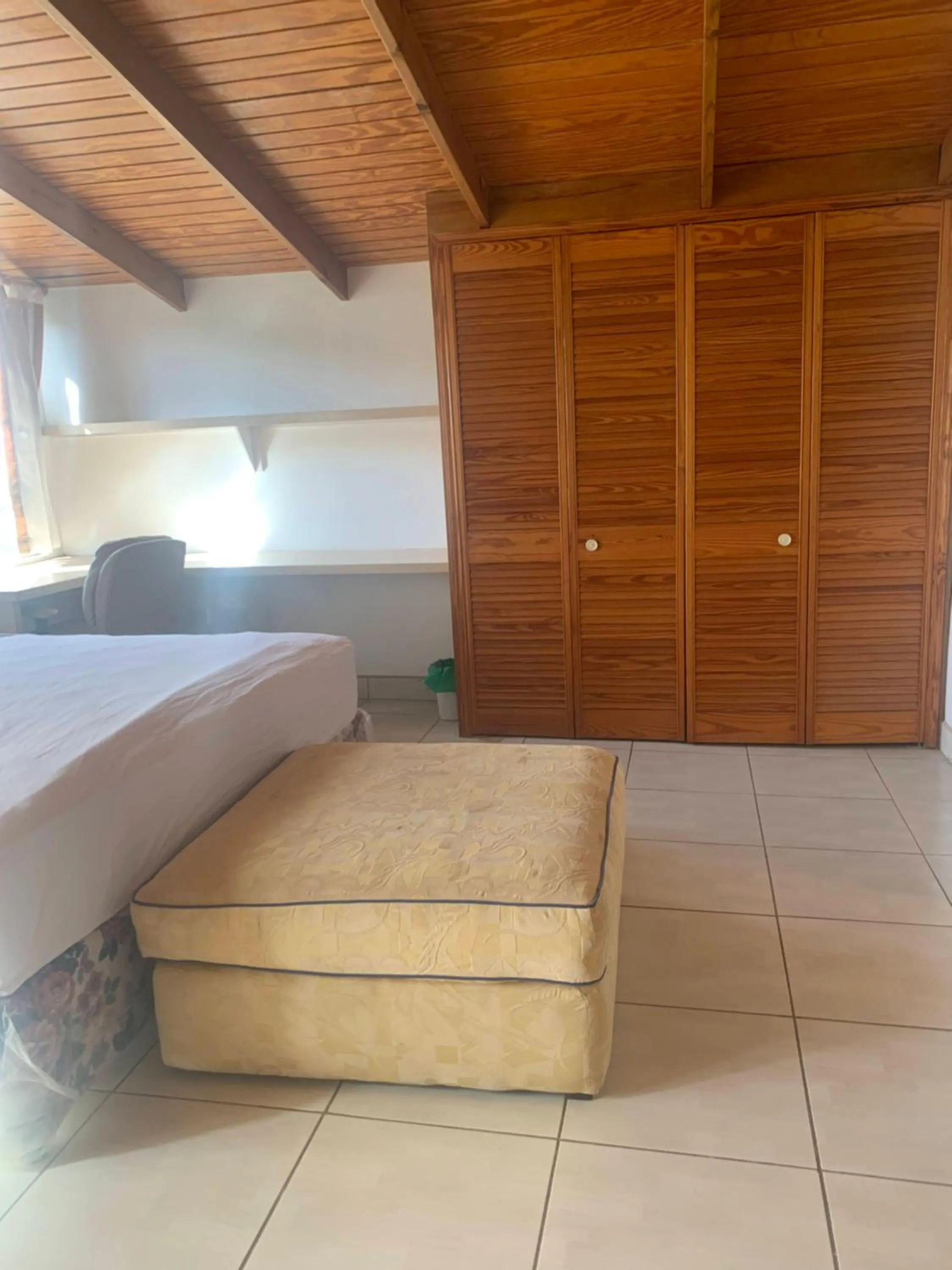 wardrobe, Bed in Cool Running Apartments