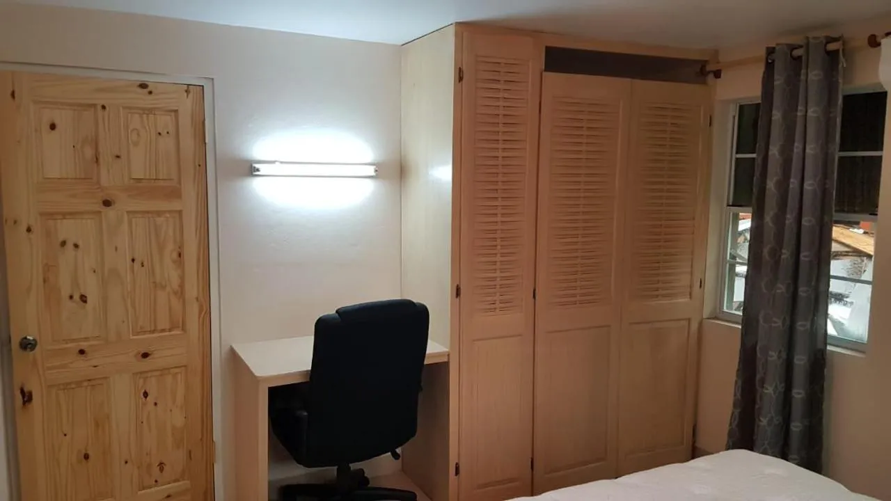 wardrobe, Bed in Cool Running Apartments