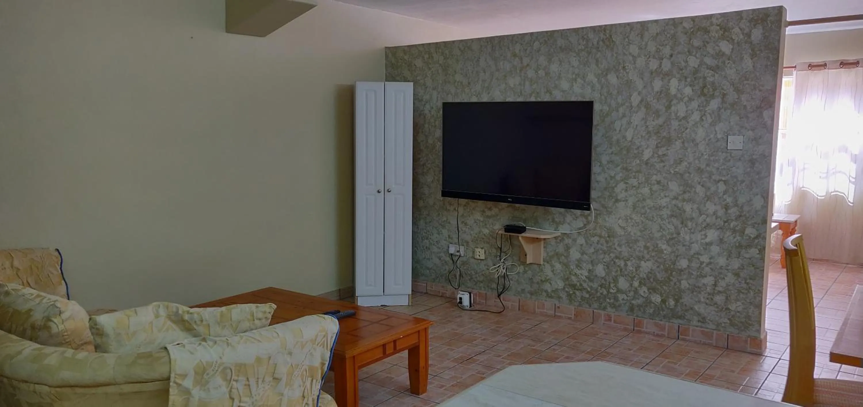 Living room in Cool Running Apartments