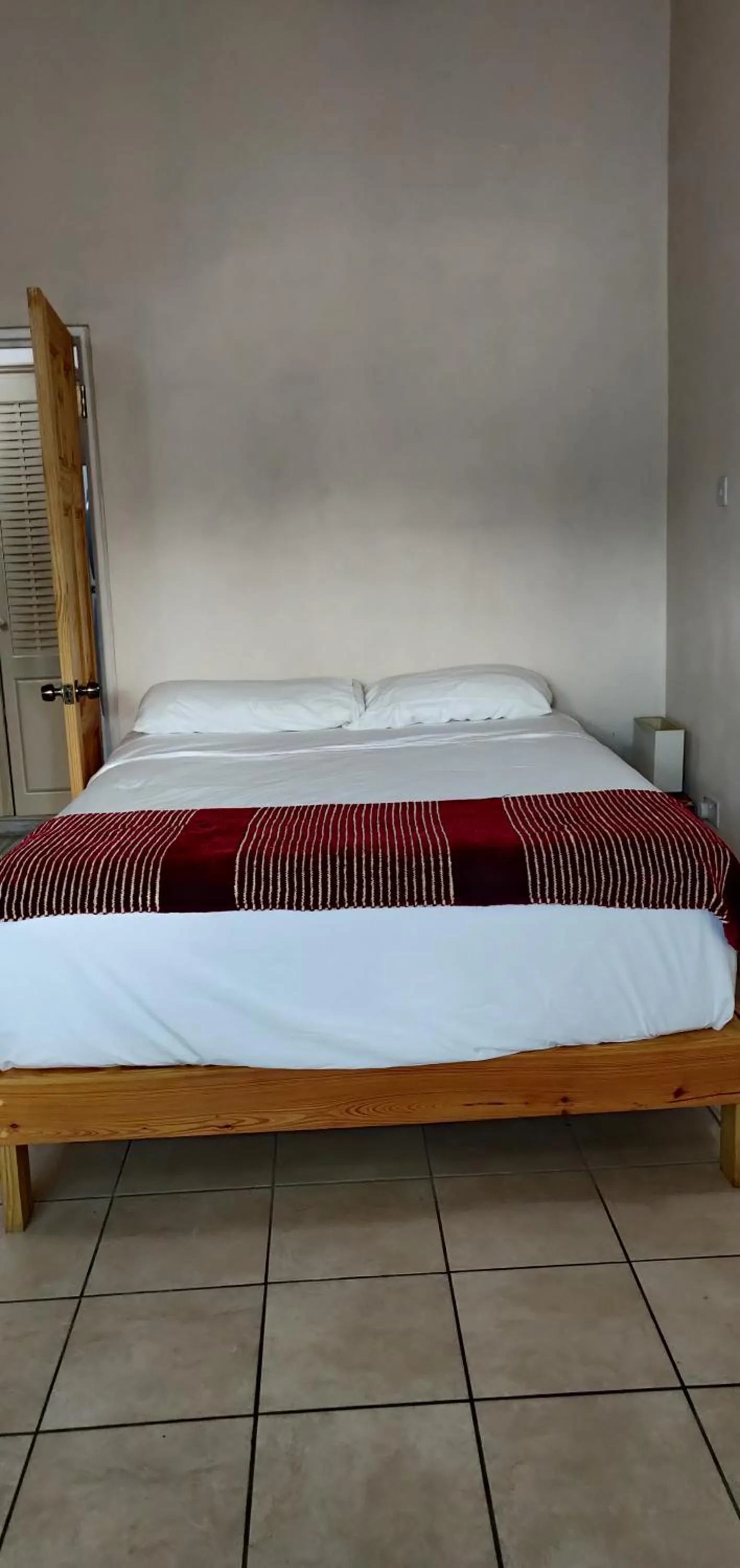 Bed in Cool Running Apartments