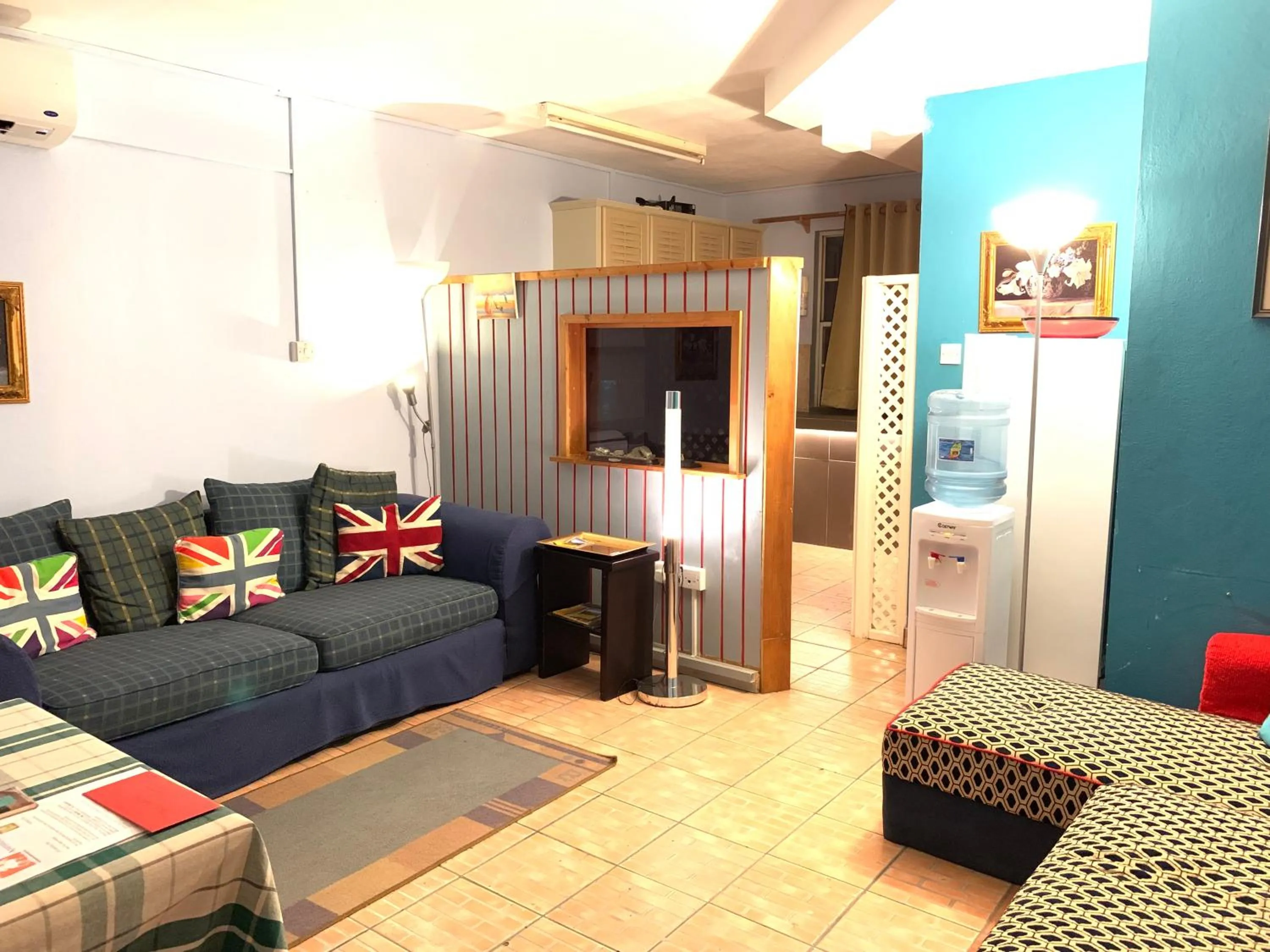 Living room, Bed in Cool Running Apartments