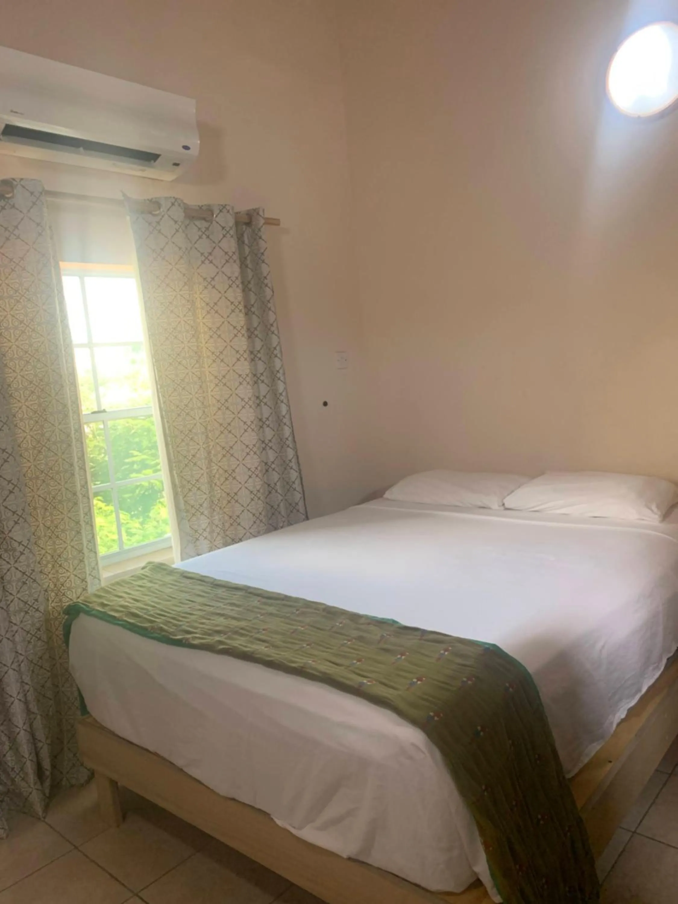 Bed in Cool Running Apartments
