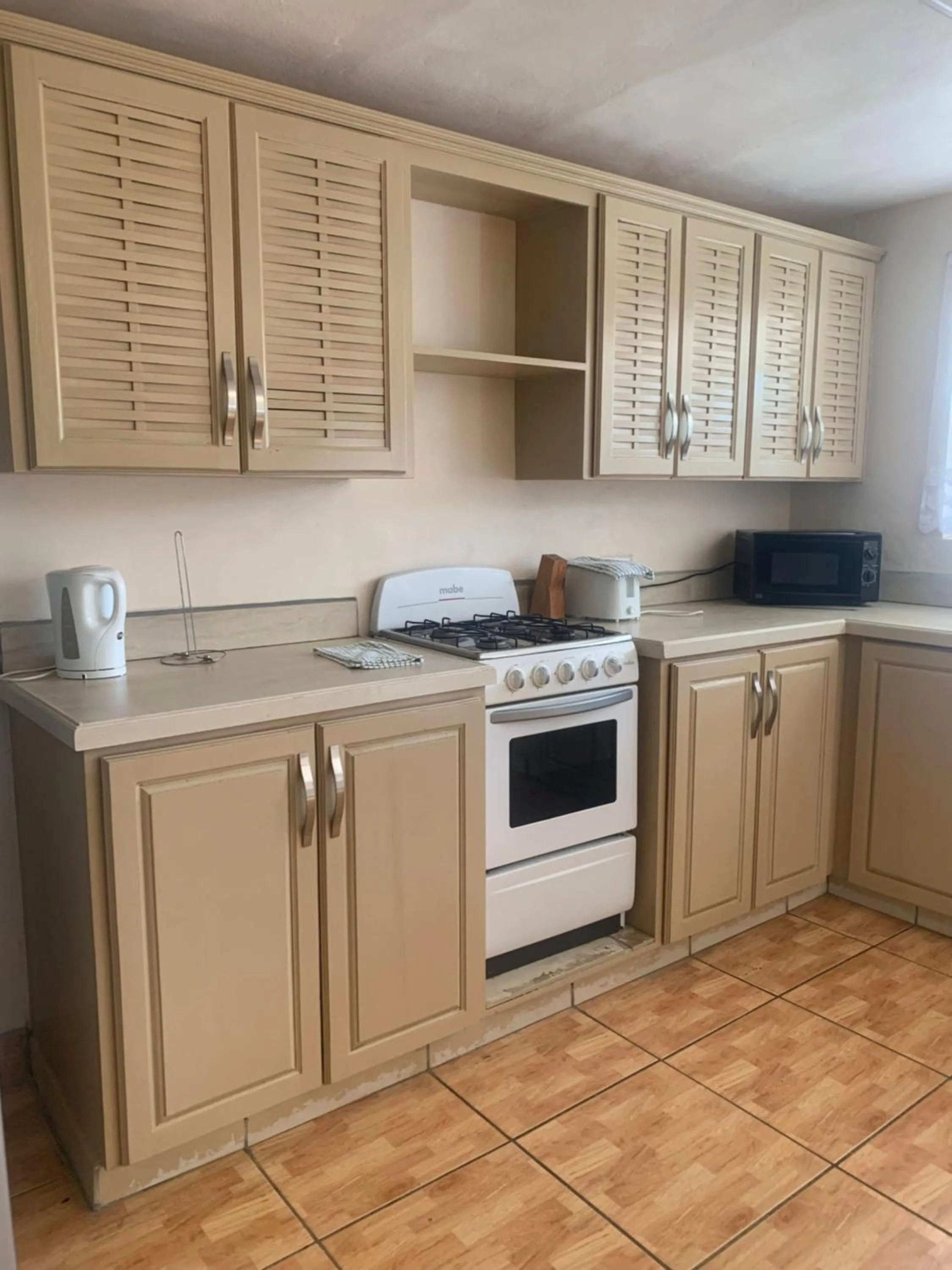 Kitchen or kitchenette in Cool Running Apartments