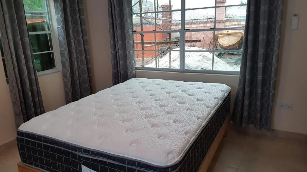 Bed in Cool Running Apartments