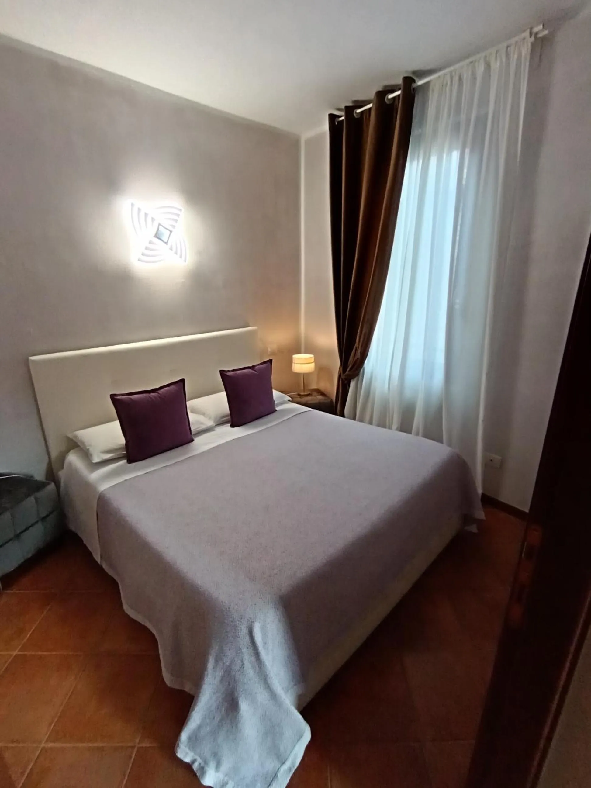 Bed in Luxury Suite Sirmione