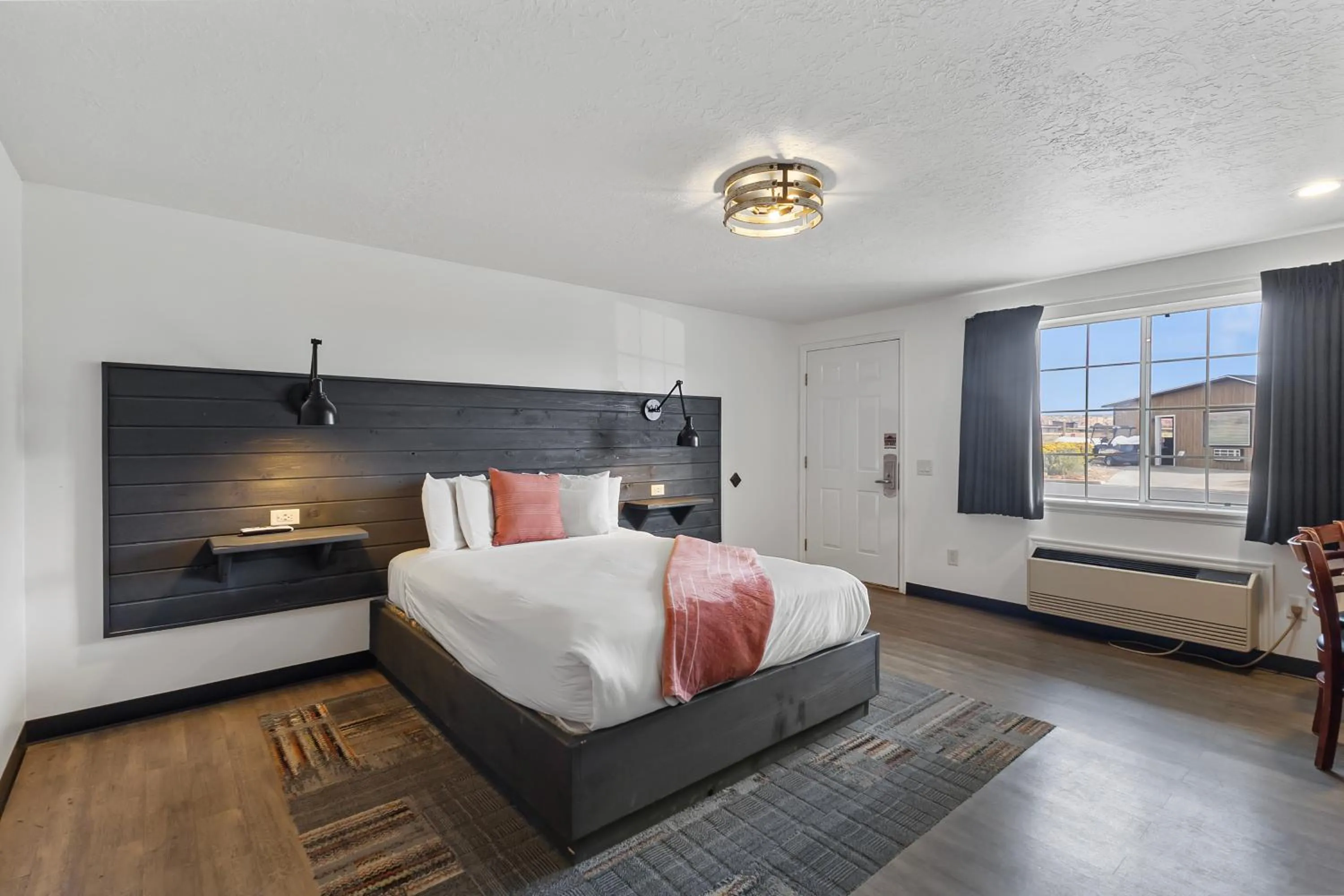 Bed in Broken Spur Inn & Steakhouse