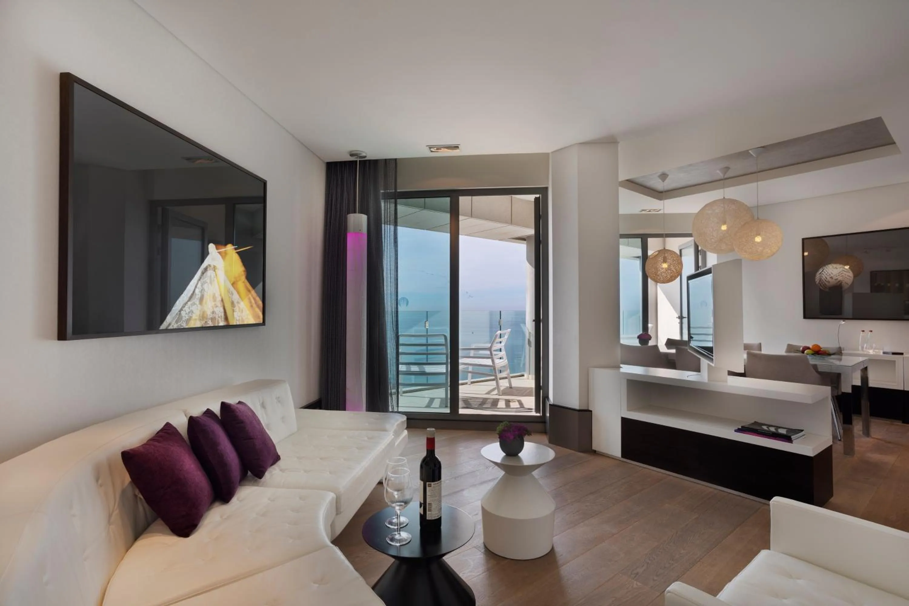Living room, Bed in Royal Beach Hotel Tel Aviv by Isrotel Exclusive