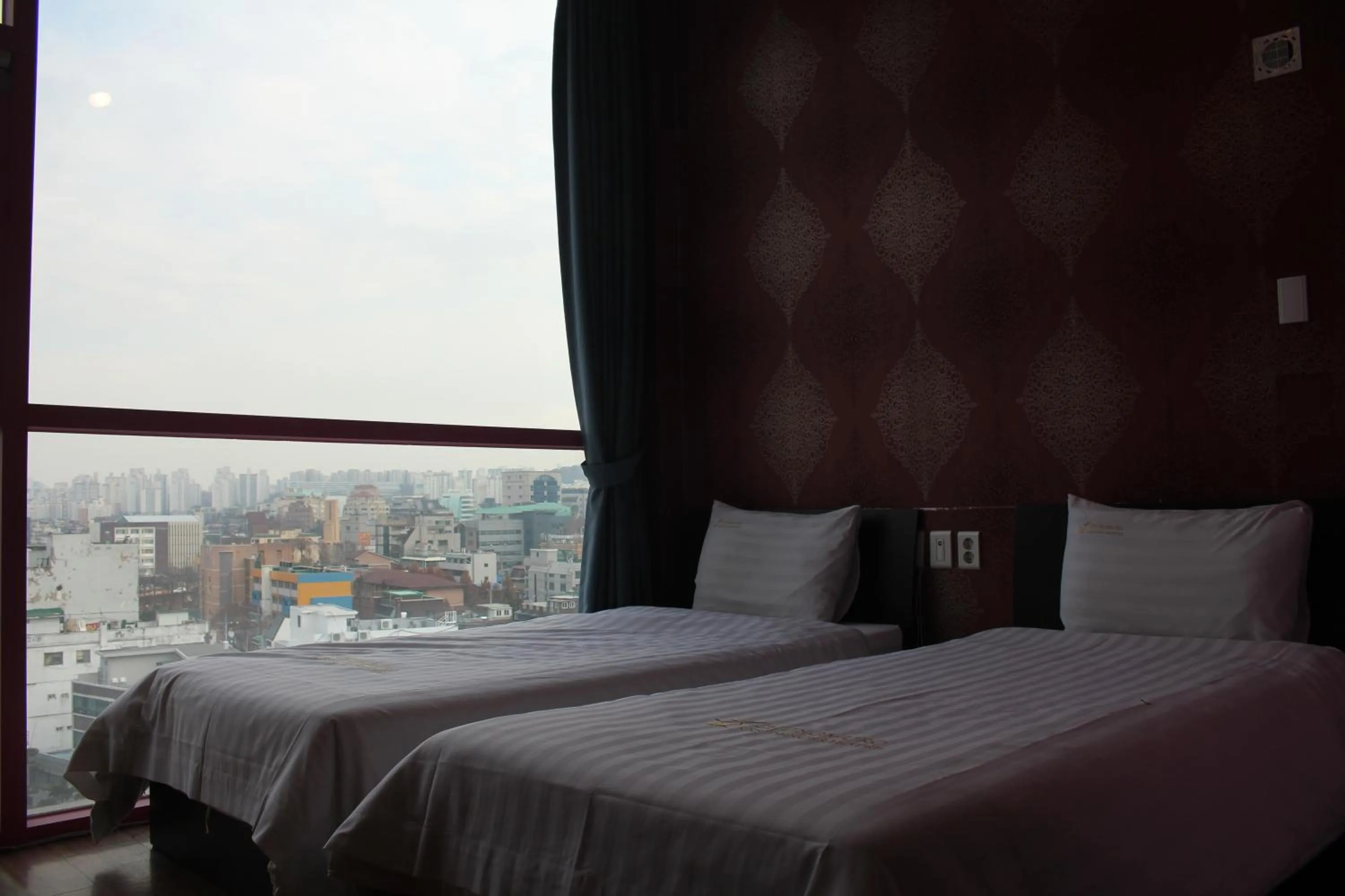 Bed in Myeongdong Merlin Hotel