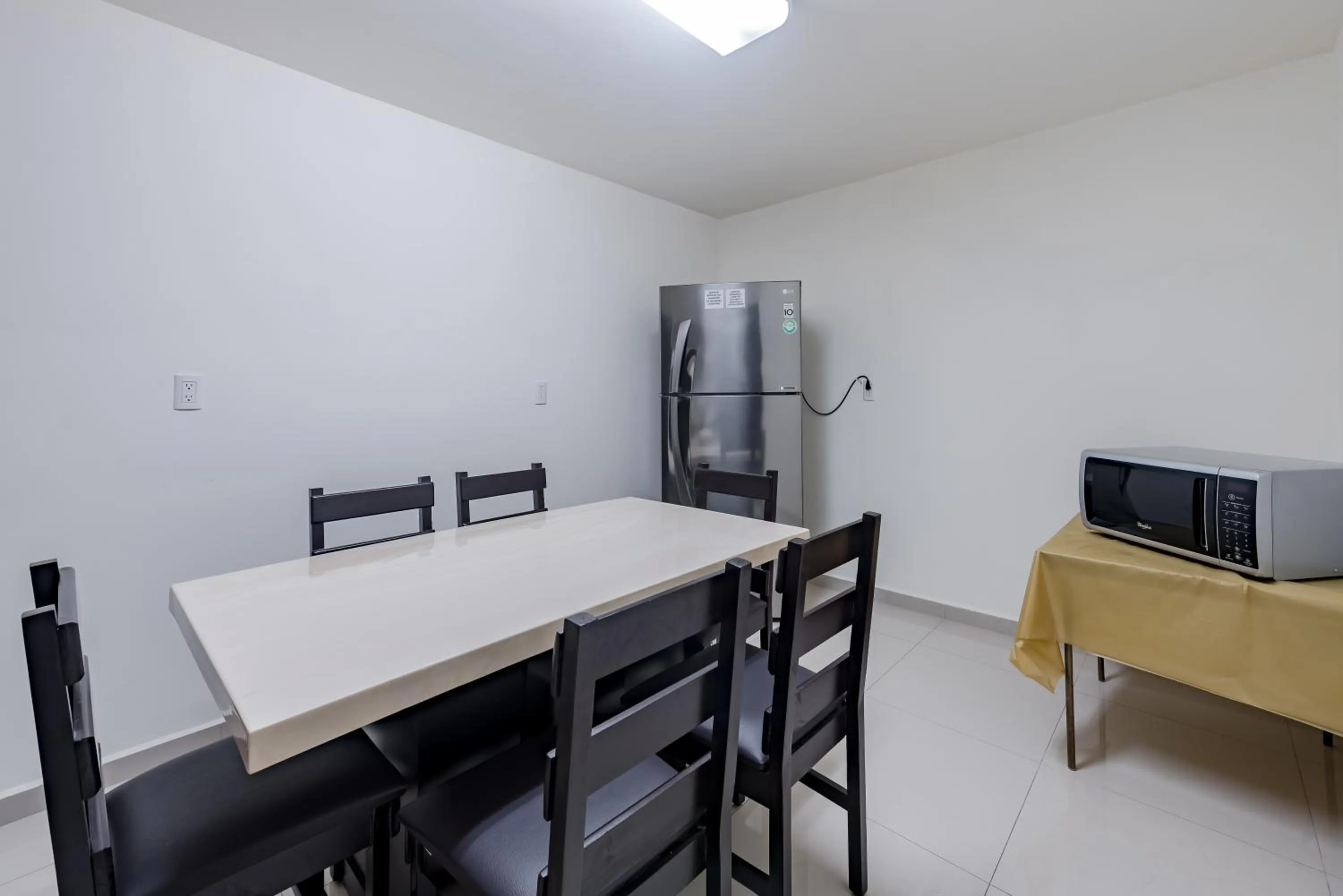 Dining area in Suites Ejecutivas Monterrey