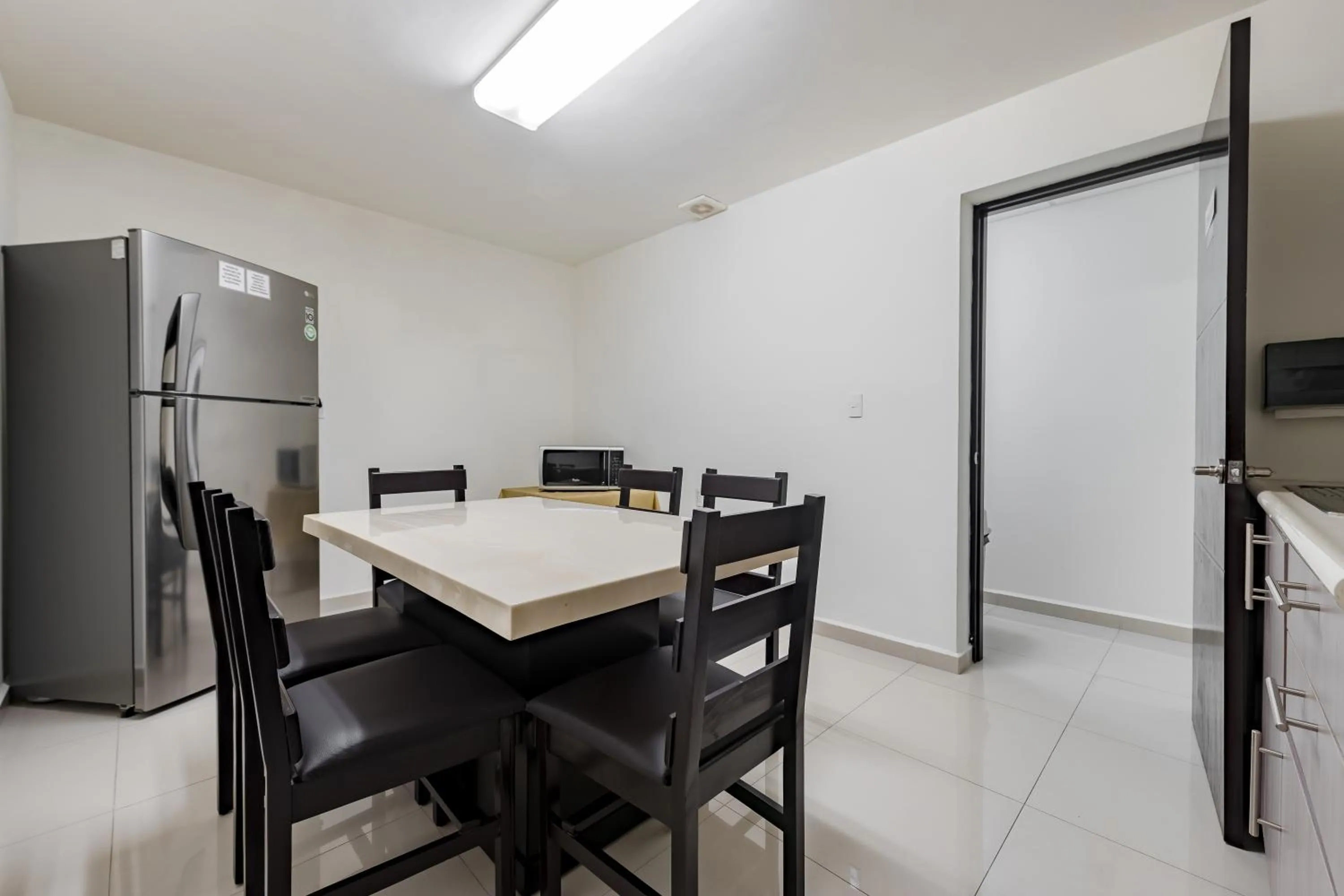 Dining area in Suites Ejecutivas Monterrey