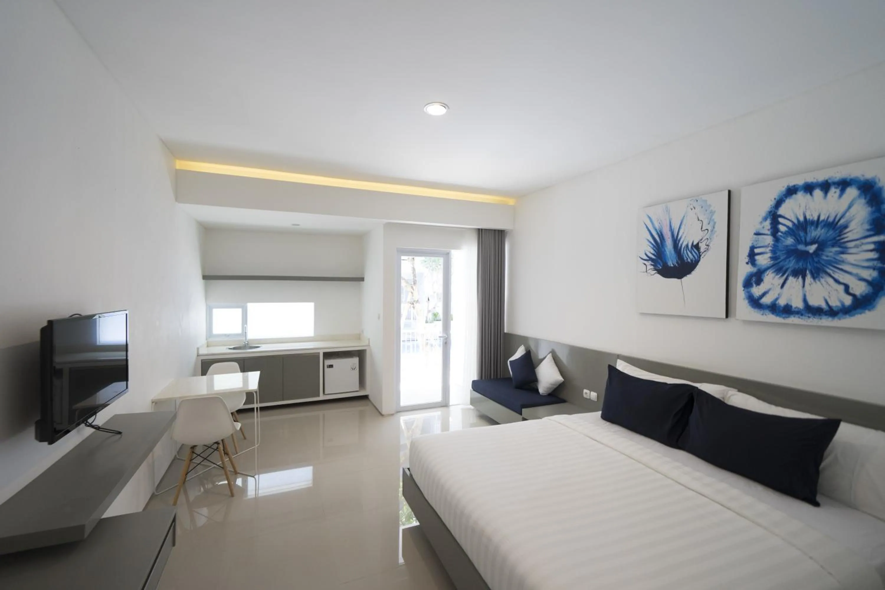 Photo of the whole room, Bed in The Rooms Apartment Bali by ARM Hospitality