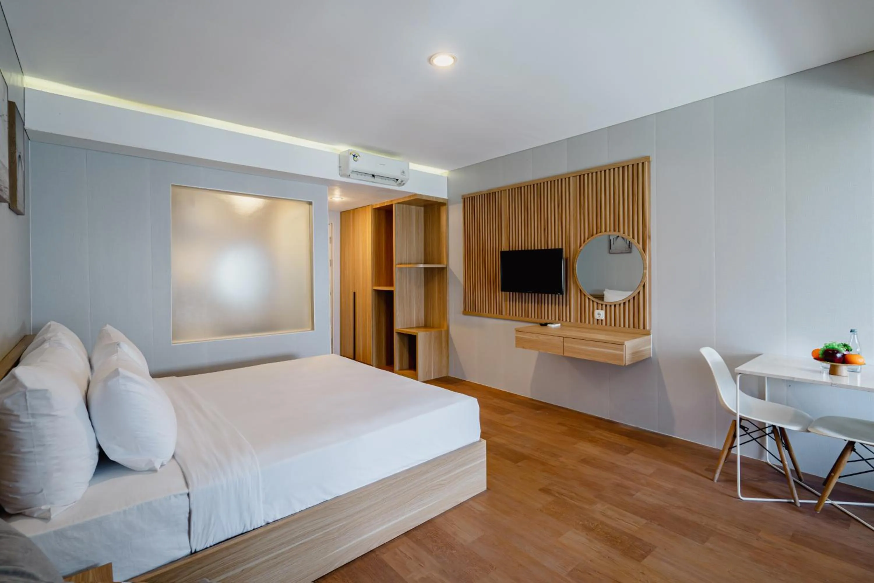TV and multimedia, Bed in The Rooms Apartment Bali by ARM Hospitality