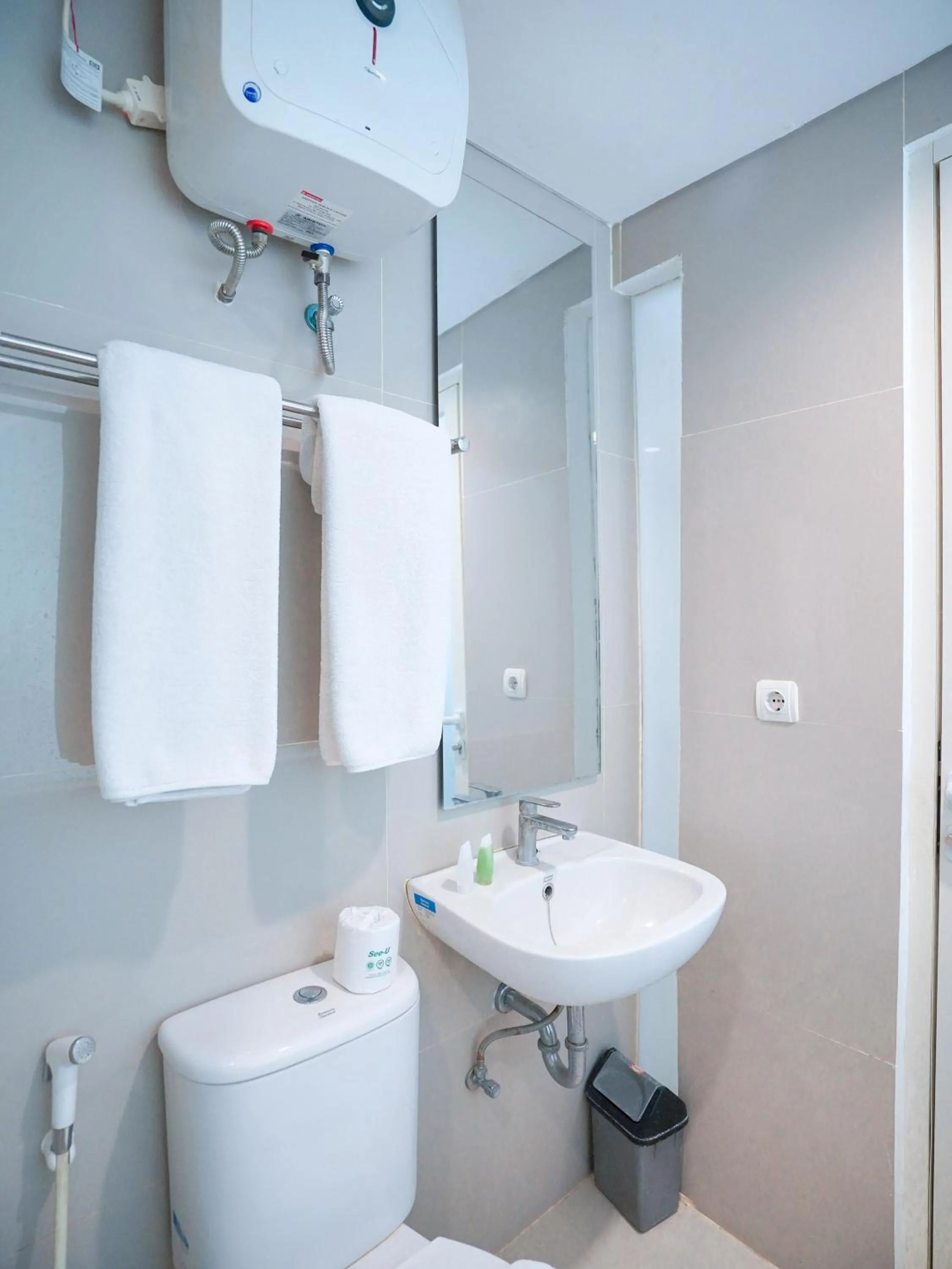 Shower in The Rooms Apartment Bali by ARM Hospitality