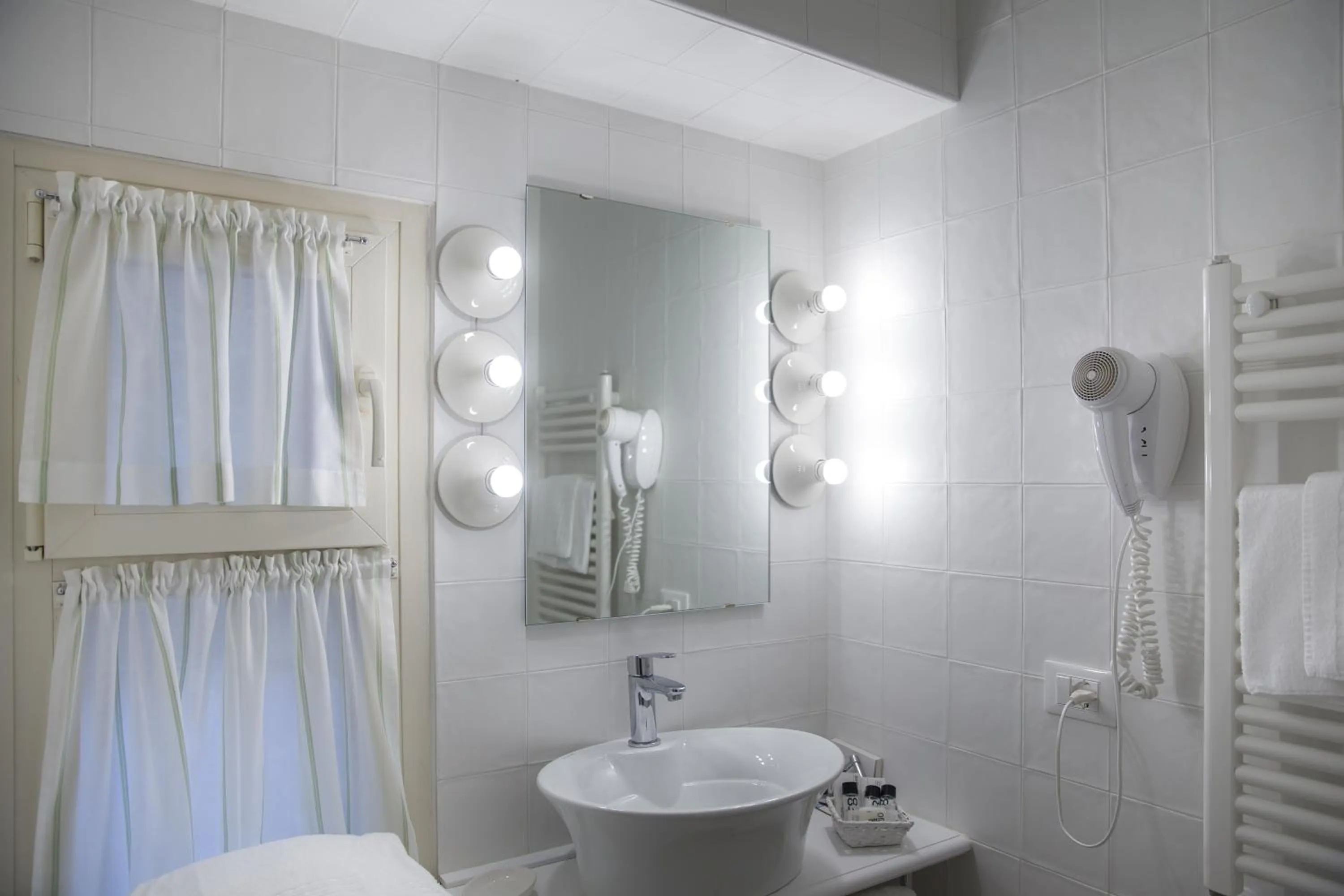 Bathroom in Hotel Degli Oleandri