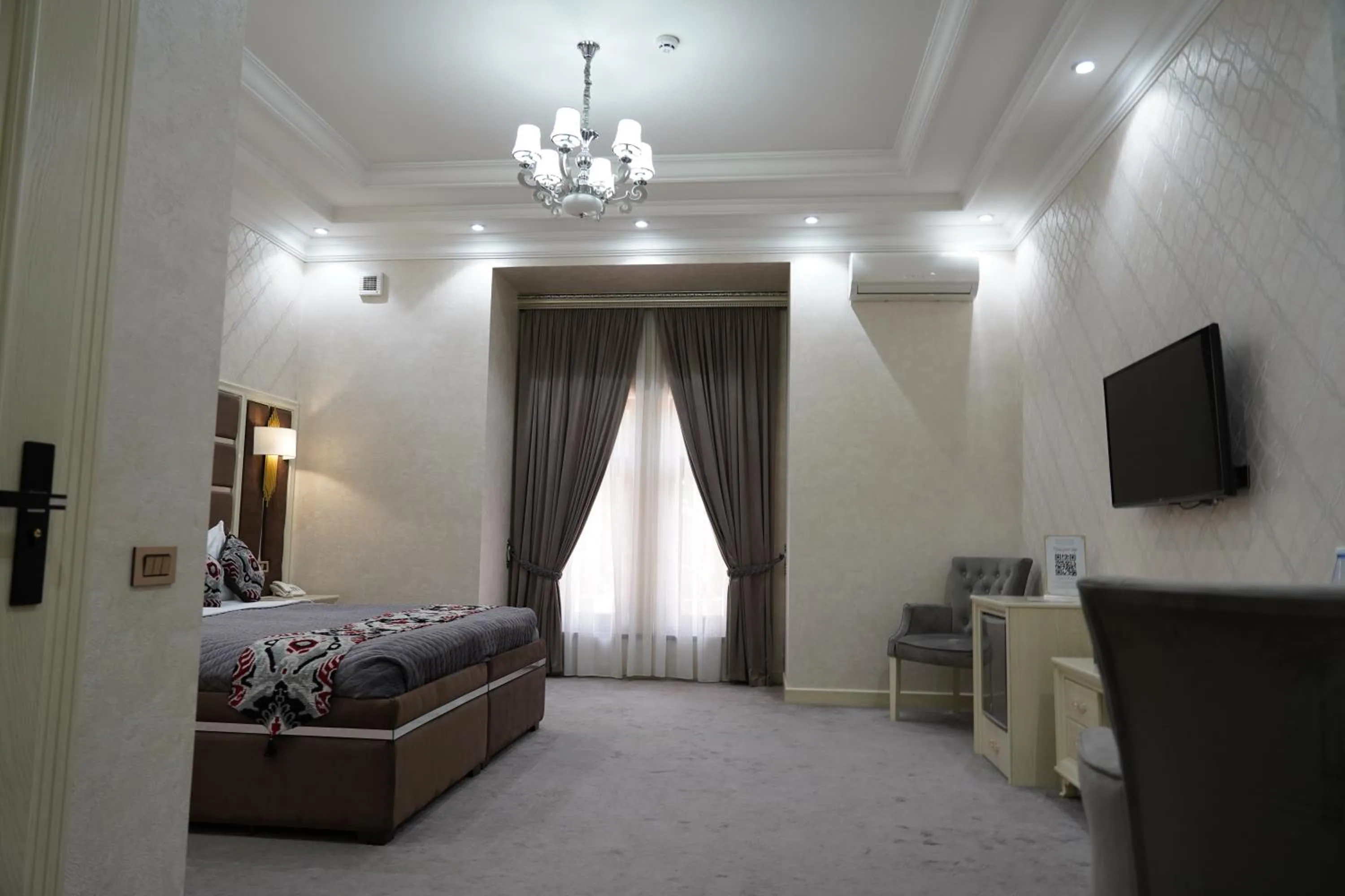 Bed in Shaxzoda Elite Hotel