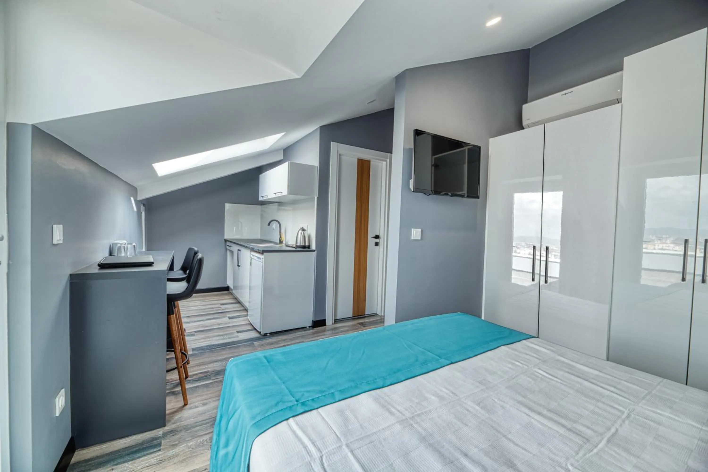 Bed in Grisverde Suites