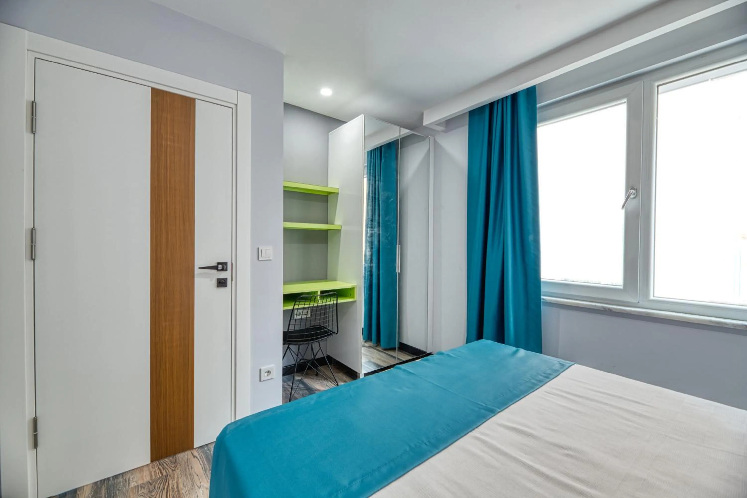 Bed in Grisverde Suites