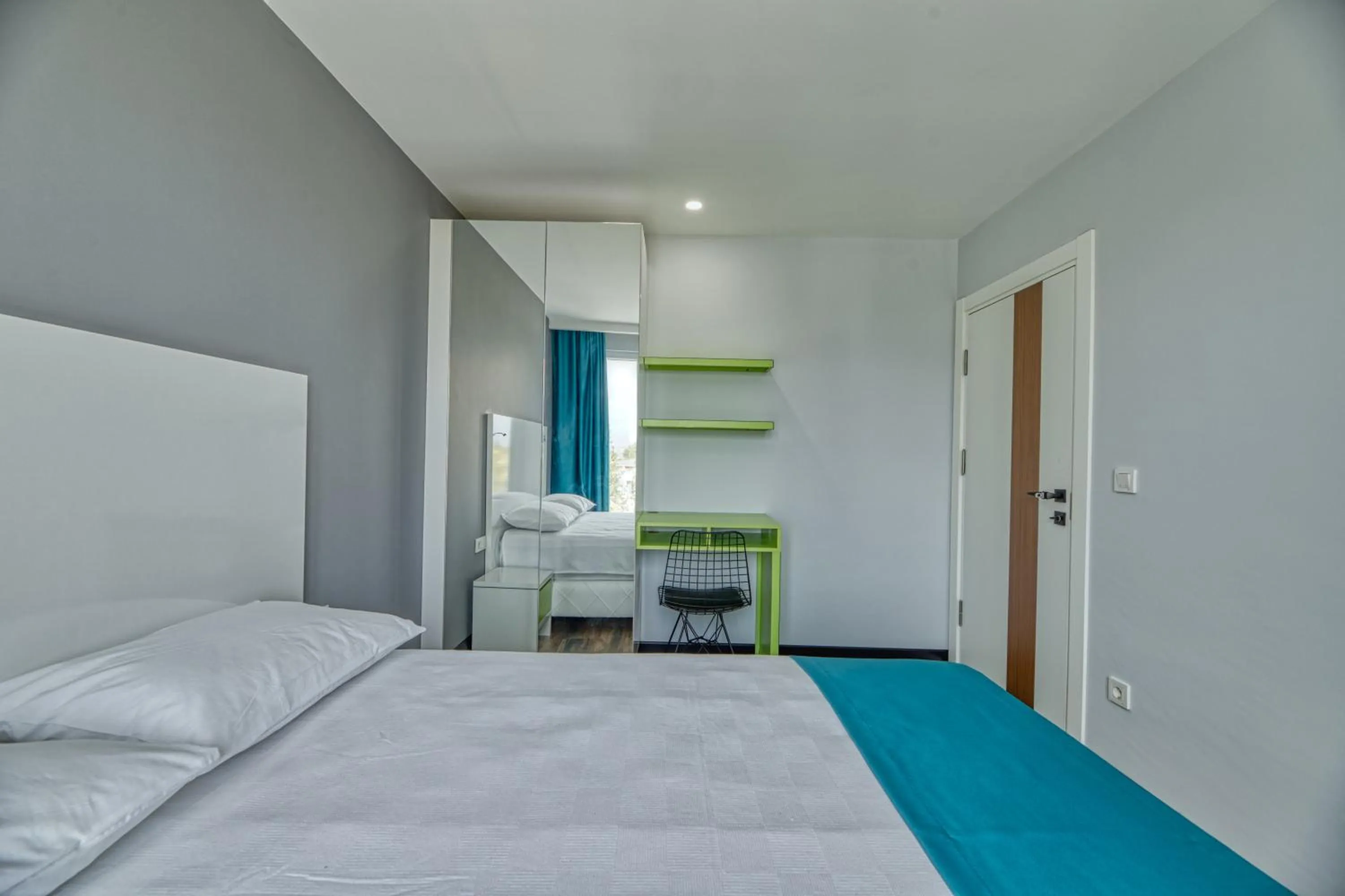 Bed in Grisverde Suites