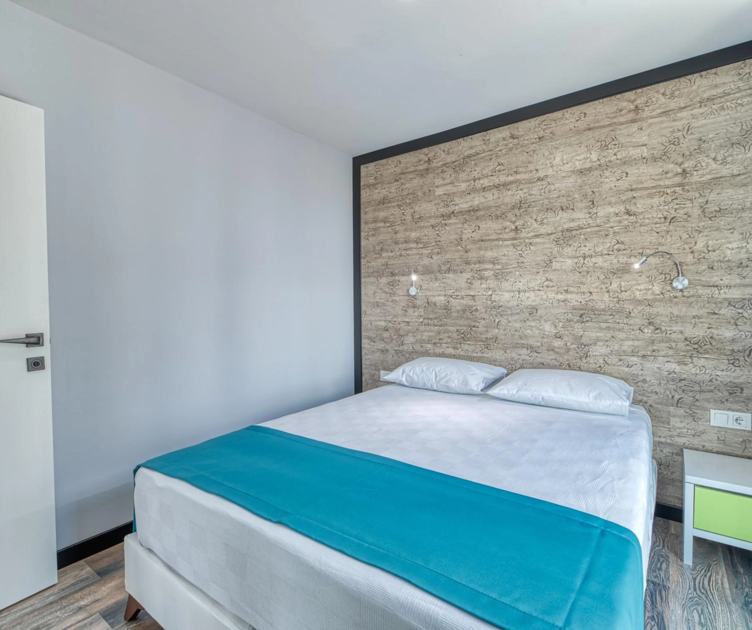 Bed in Grisverde Suites