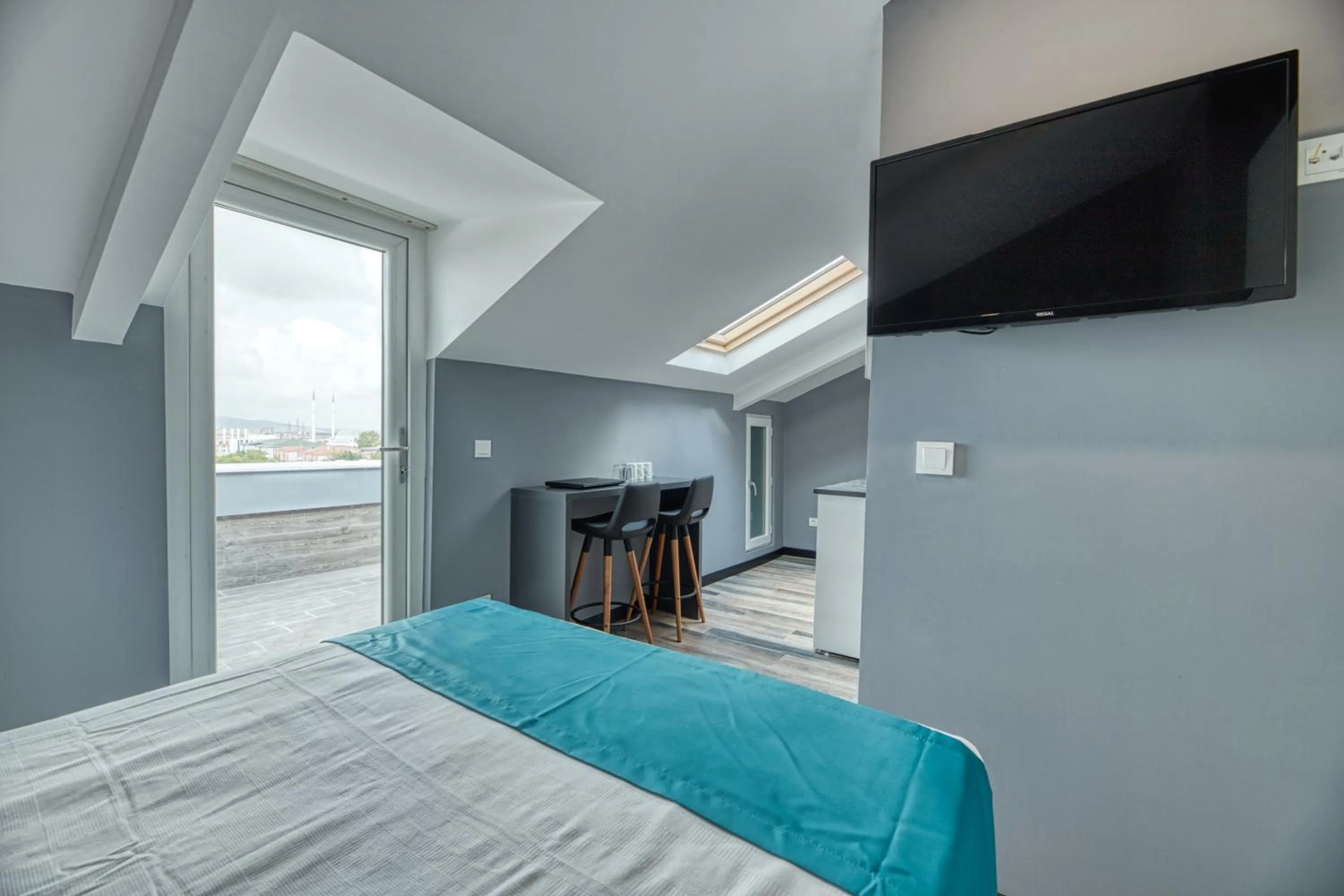 Bed in Grisverde Suites