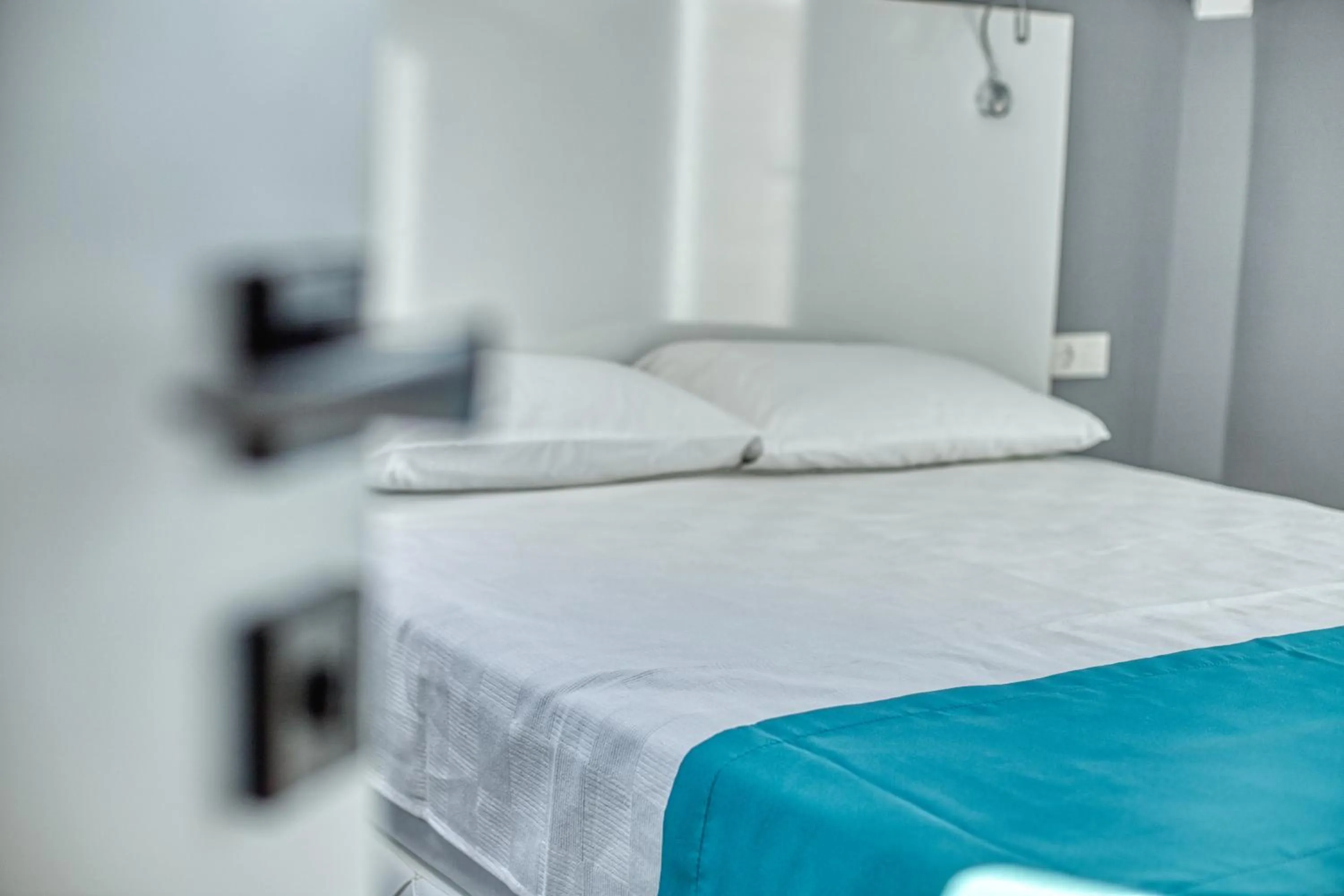 Bed in Grisverde Suites