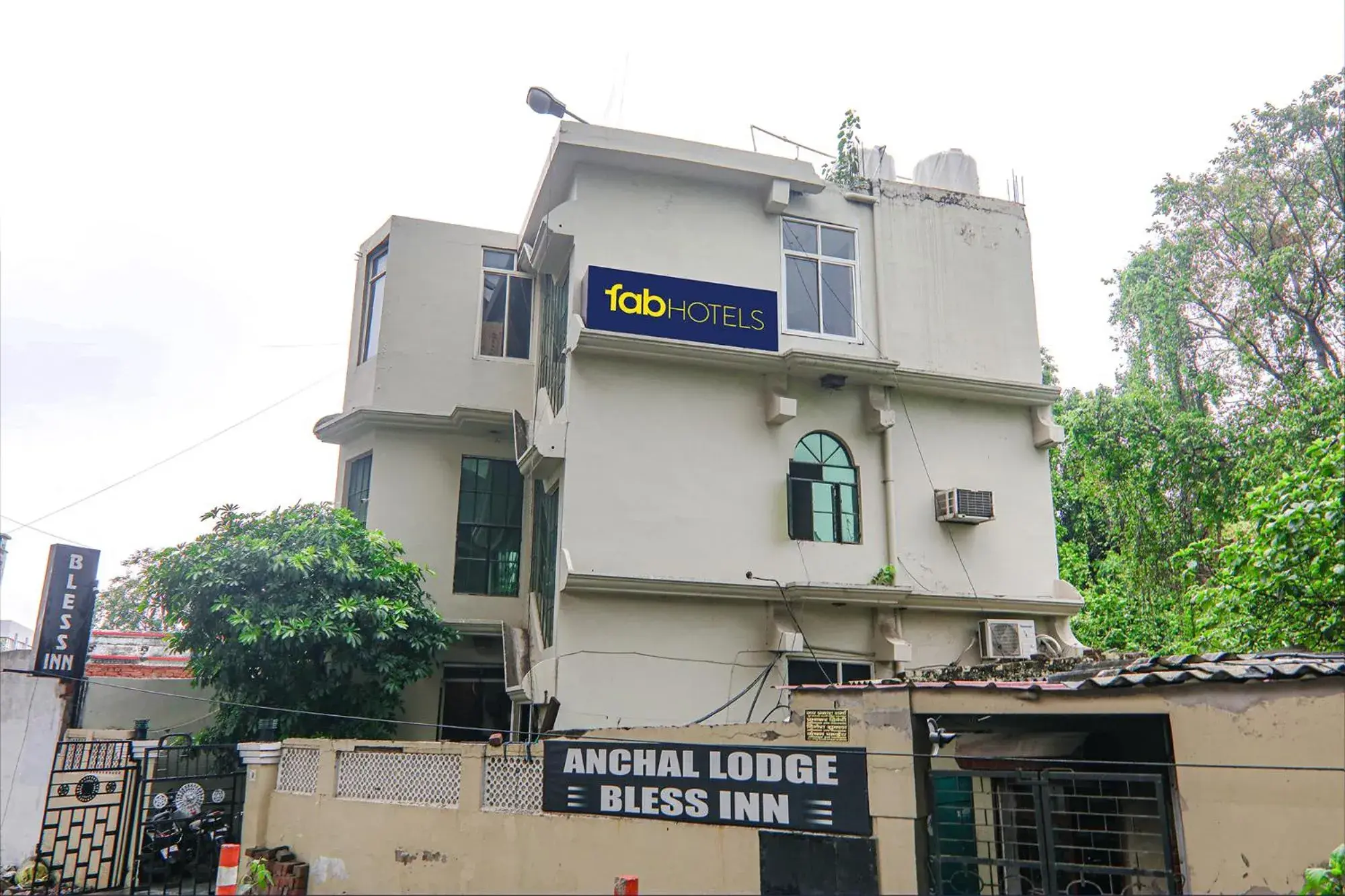 Property building in FabHotel Bless Inn Property building in FabHotel Bless Inn