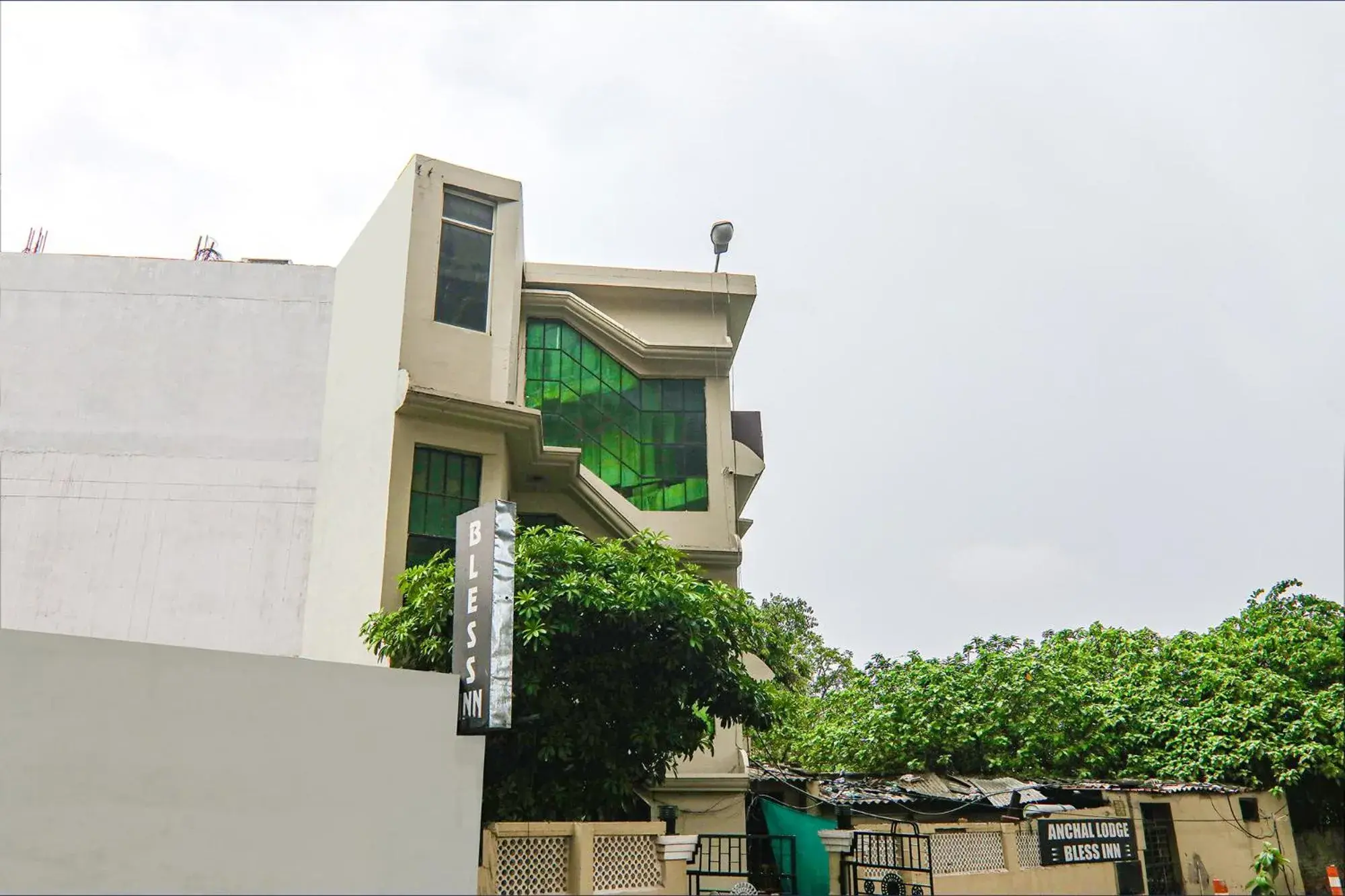 Property building in FabHotel Bless Inn Property building in FabHotel Bless Inn