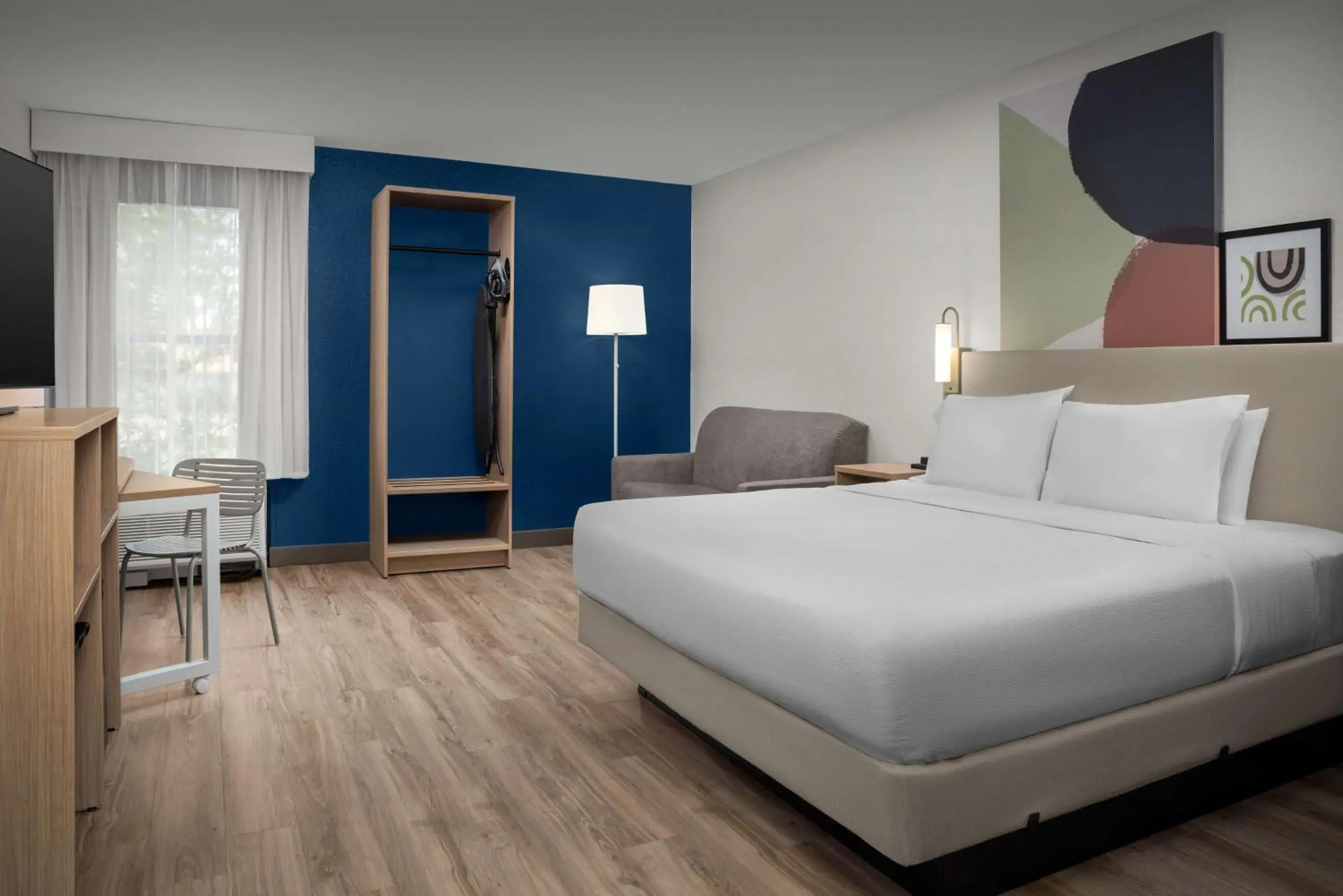 Living room, Bed in Spark by Hilton Tampa Brandon Living room, Bed in Spark by Hilton Tampa Brandon