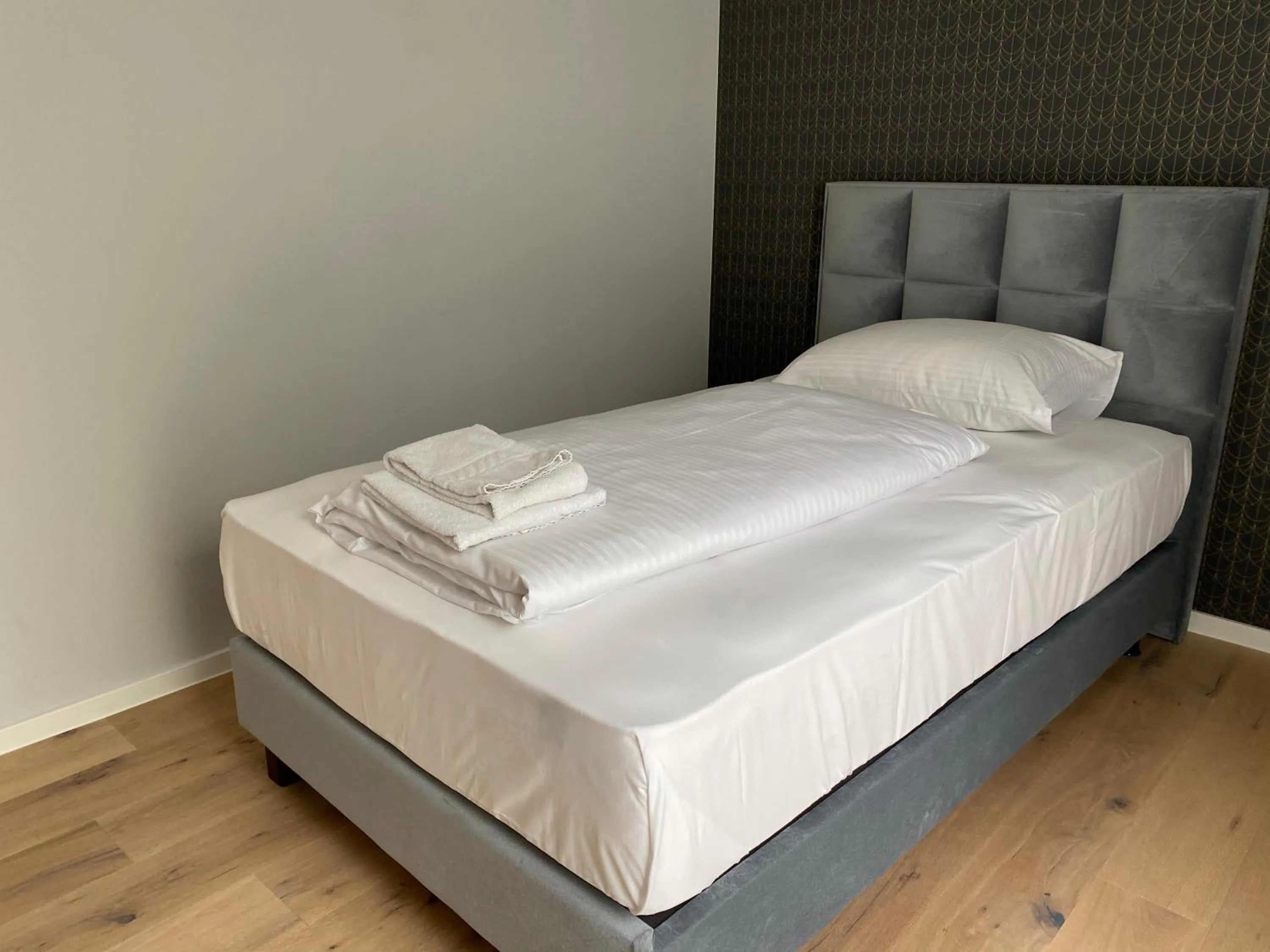 Bed in Sleep Inn Düsseldorf Suites