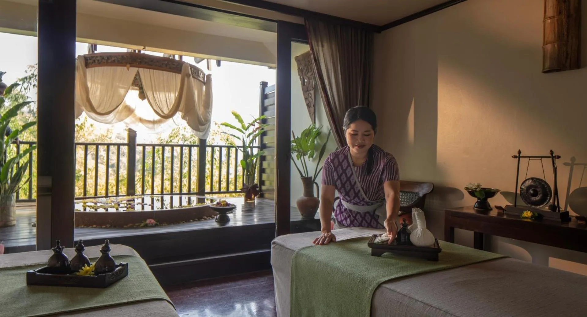 Bed in Anantara Golden Triangle Elephant Camp & Resort