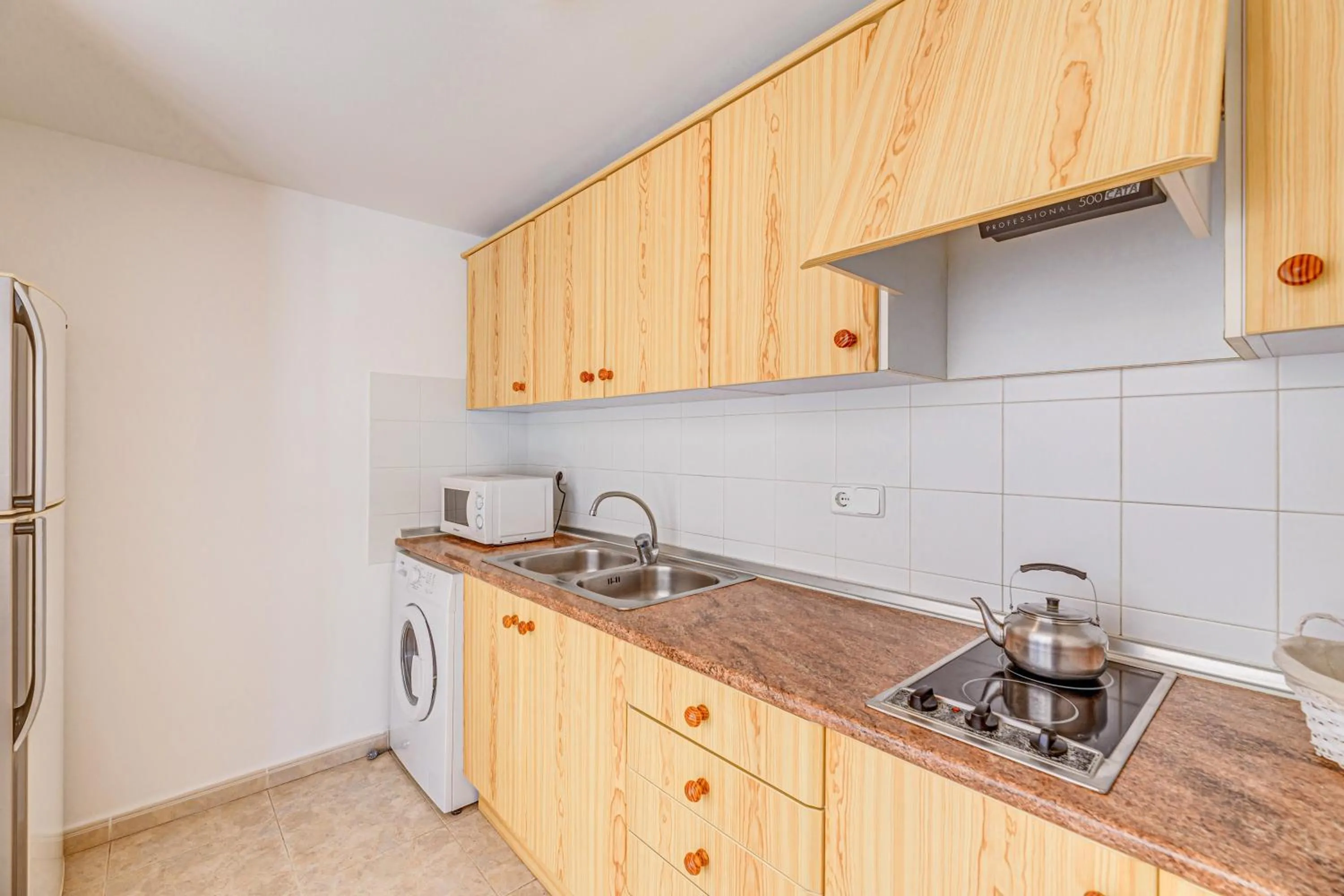 Kitchen or kitchenette in Apartamentos Karin 1ºb