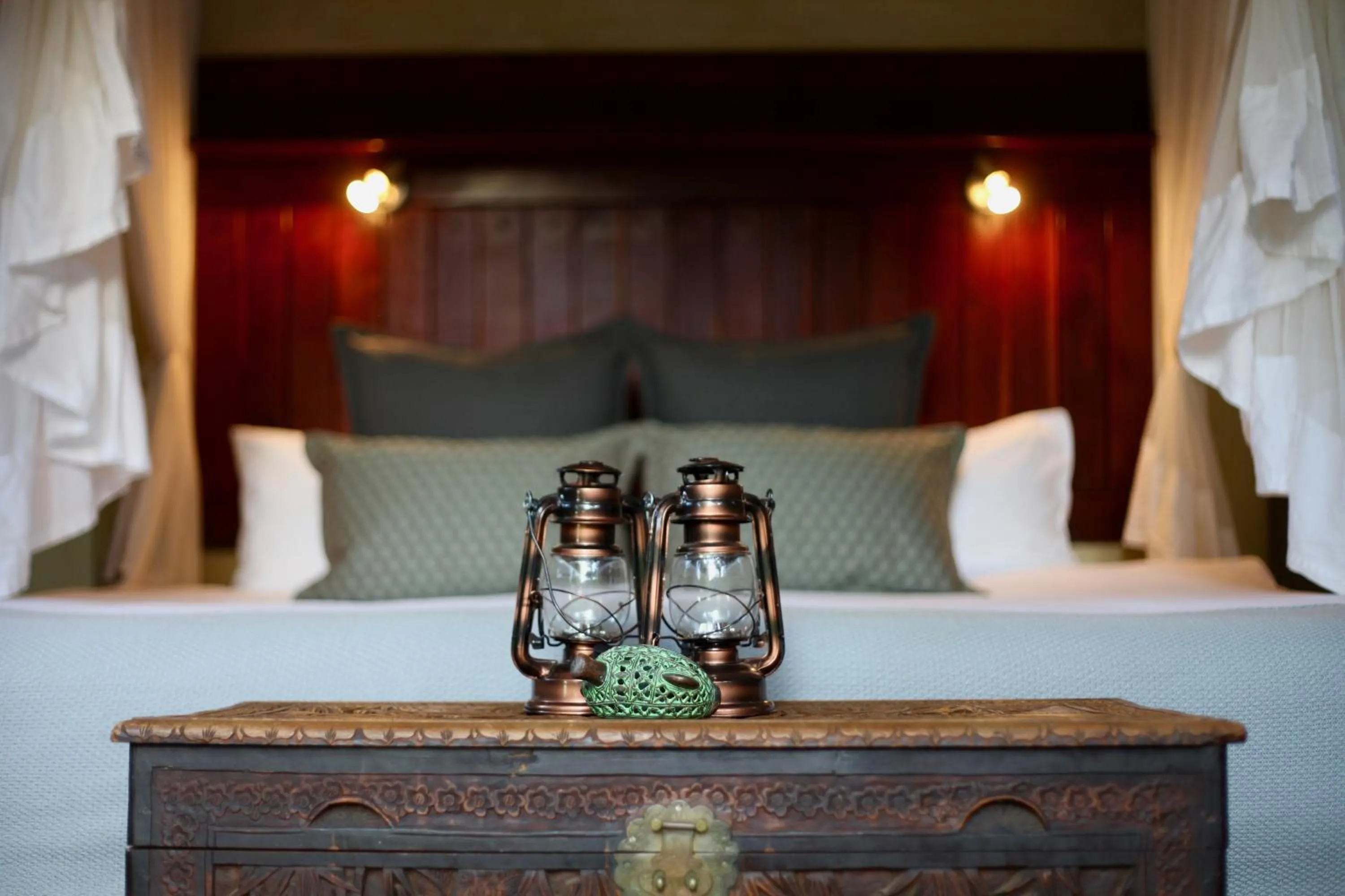 Bed in Ivory Wilderness River Rock Lodge