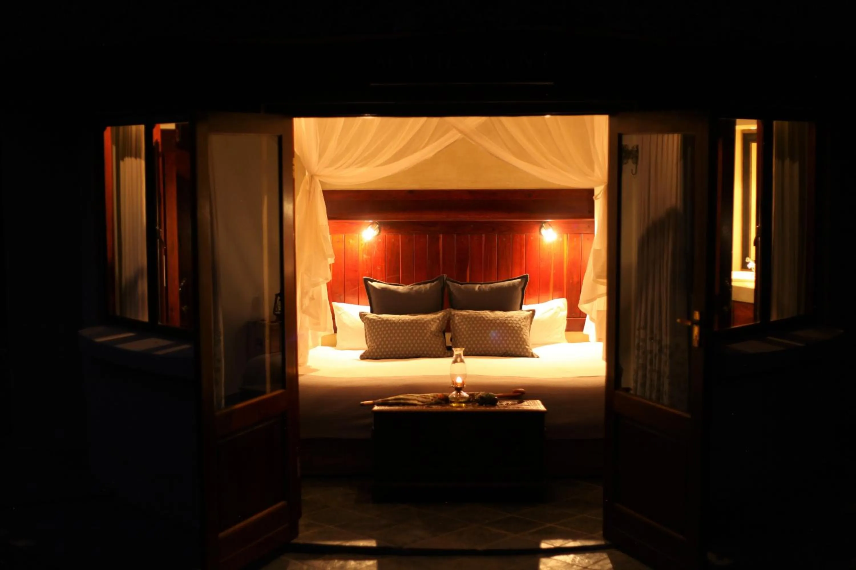 Property building, Bed in Ivory Wilderness River Rock Lodge