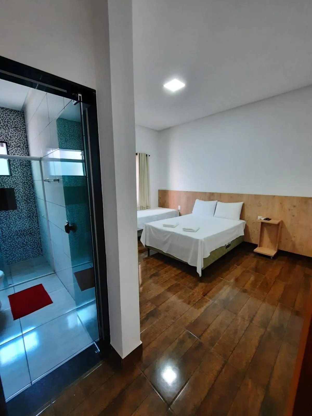 Bed in POUSADA LIMAS SUITES