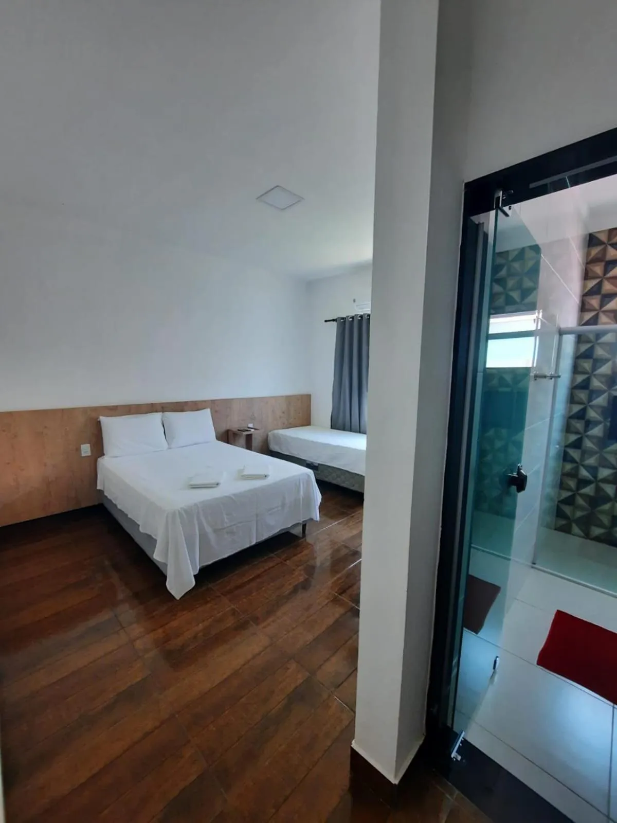 Bed in POUSADA LIMAS SUITES