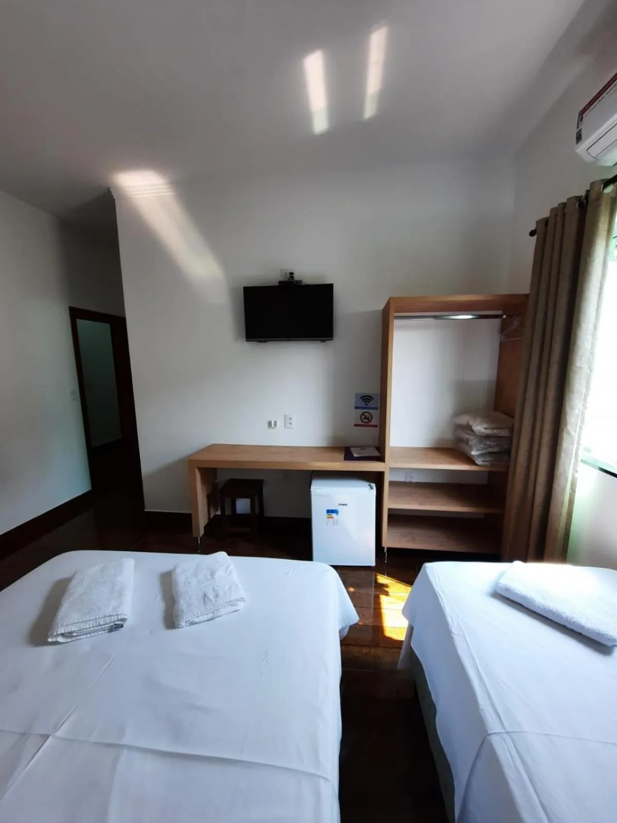 Bed in POUSADA LIMAS SUITES