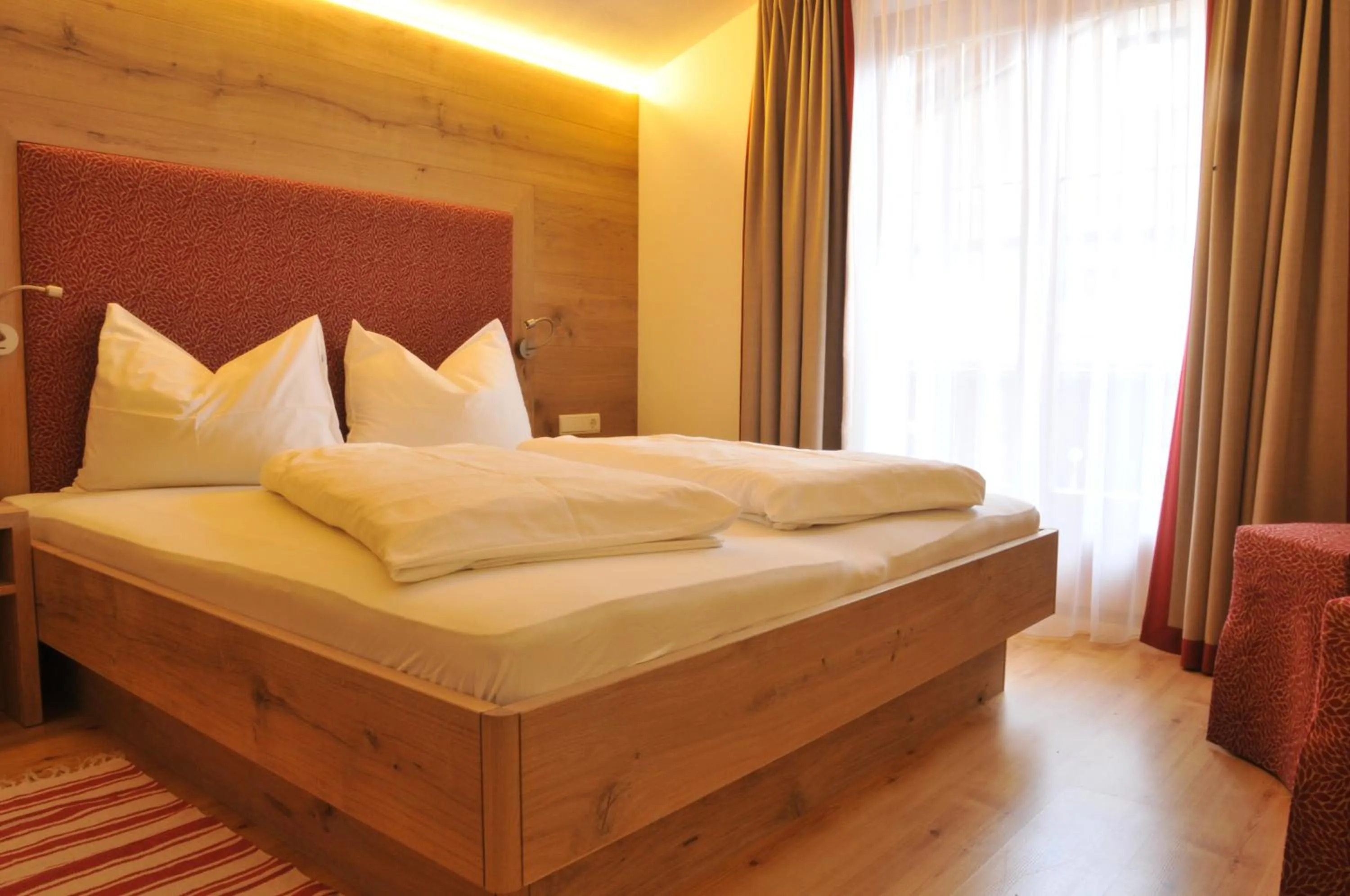 Photo of the whole room, Bed in Stauder