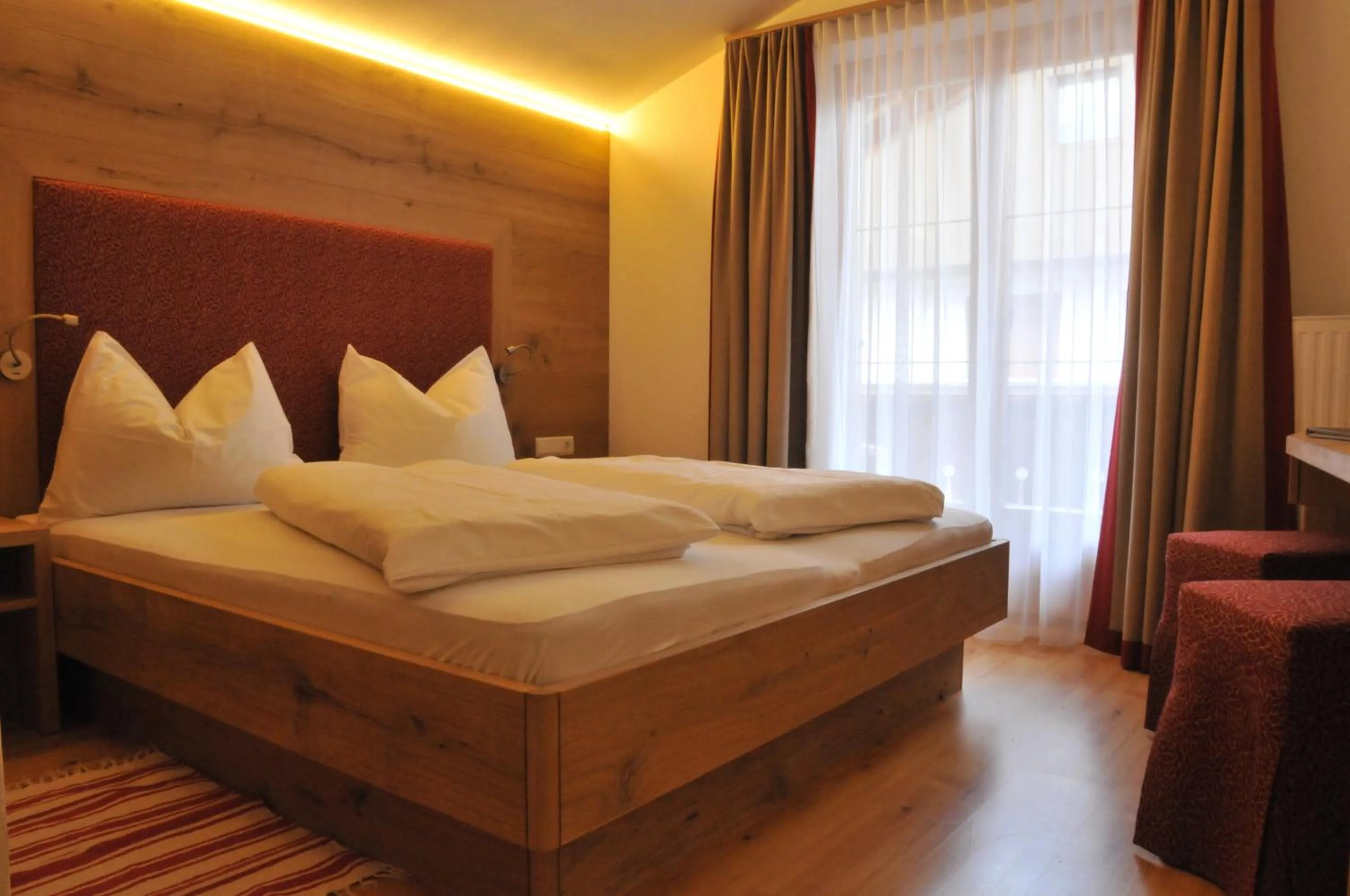 Photo of the whole room, Bed in Stauder
