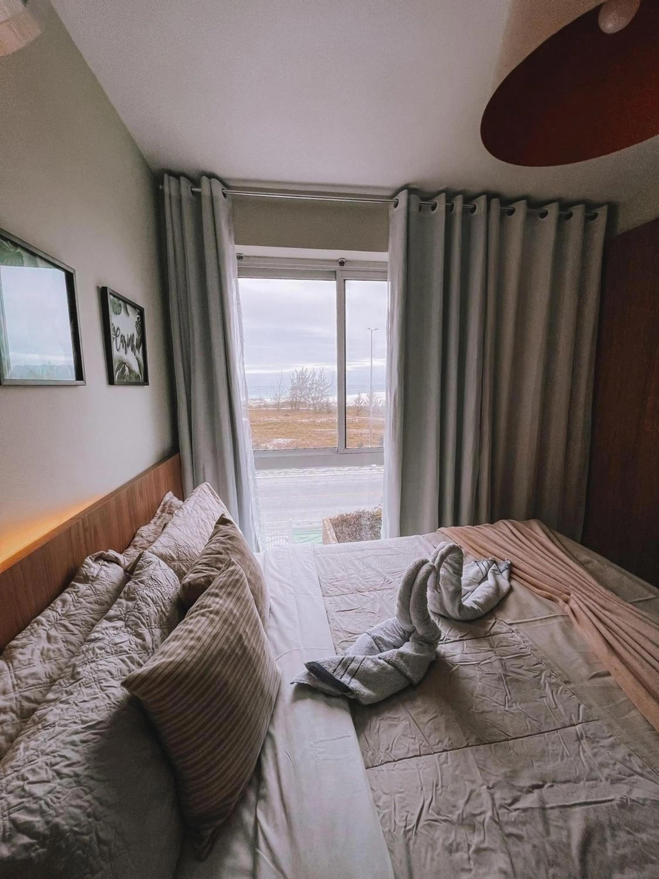 View (from property/room), Bed in Flat Mandai Cabo Frio