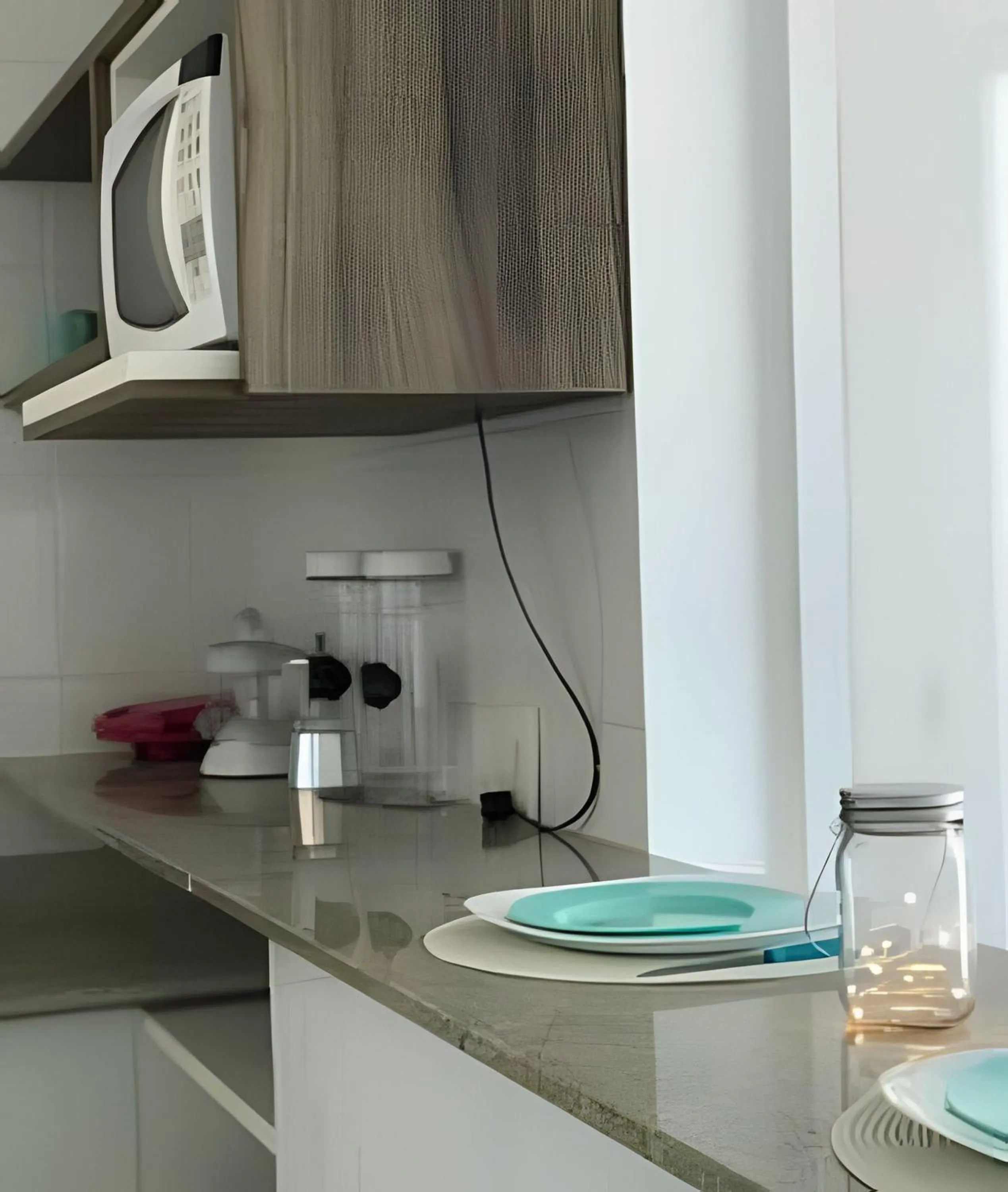 Kitchen or kitchenette in Flat Mandai Cabo Frio
