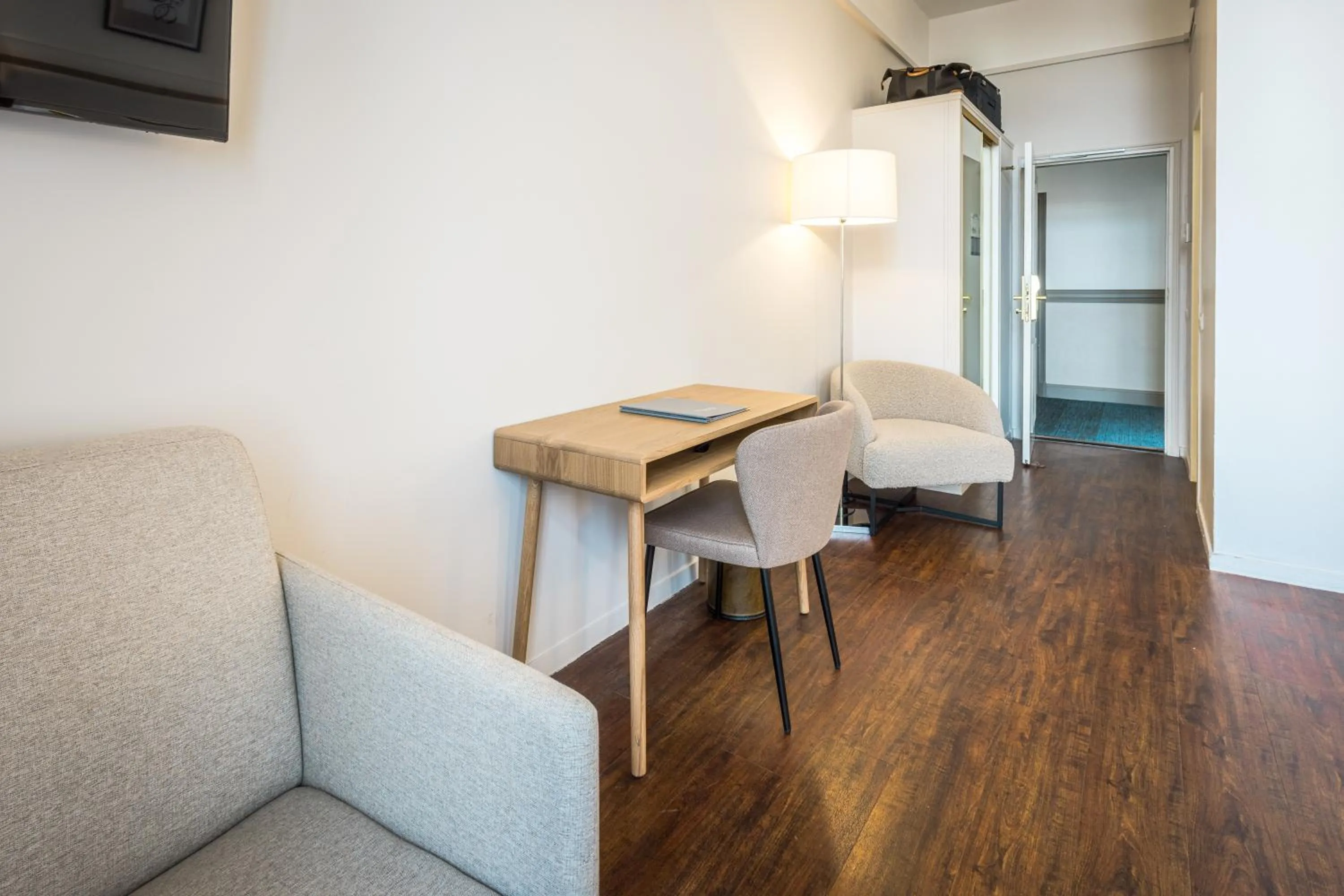 Seating area in Hôtel Miléade L'Orangeraie - entièrement rénové