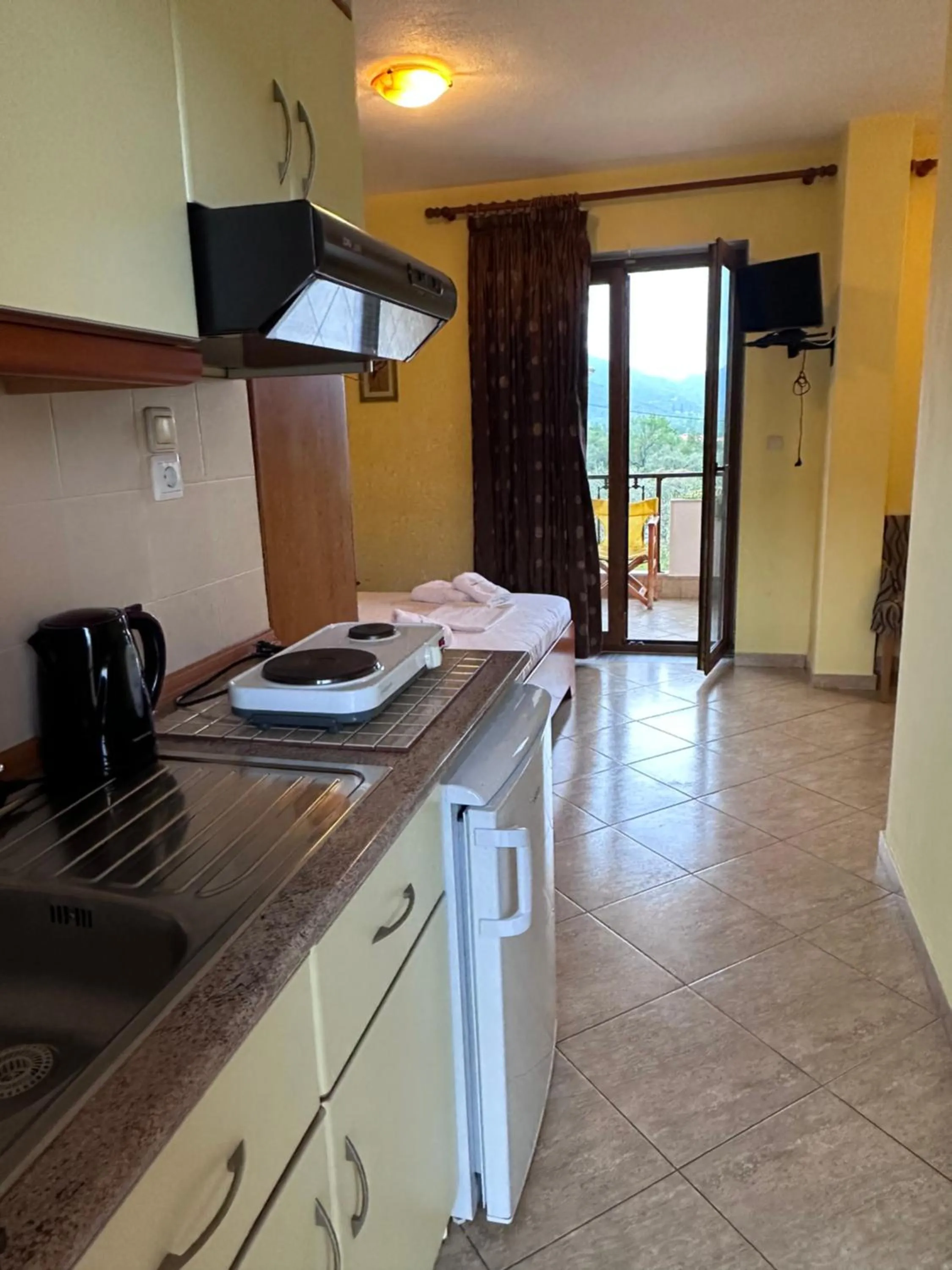 Kitchen or kitchenette in Studios Alexandros