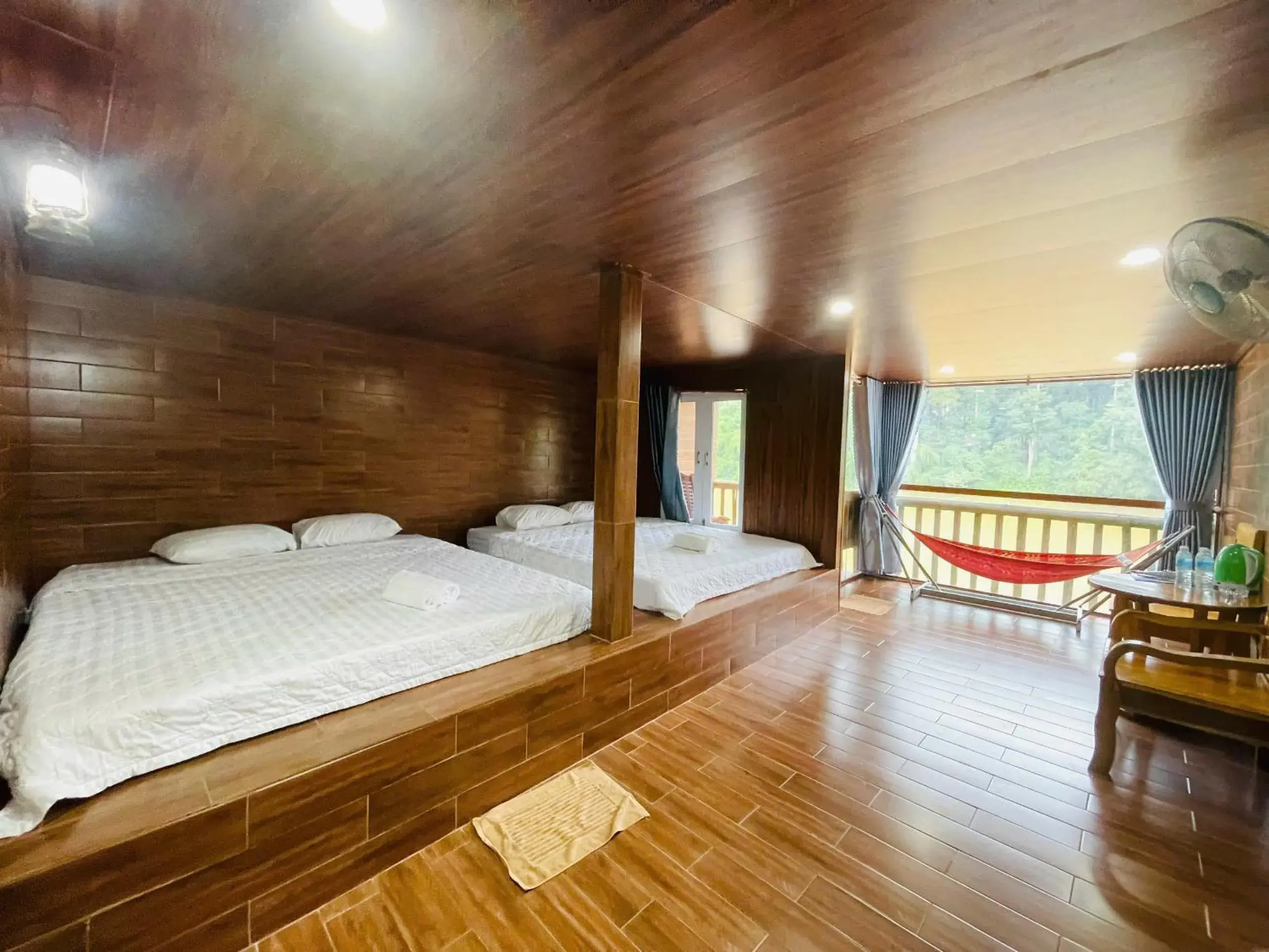 Bed in Green Bamboo Lodge Resort Bed in Green Bamboo Lodge Resort