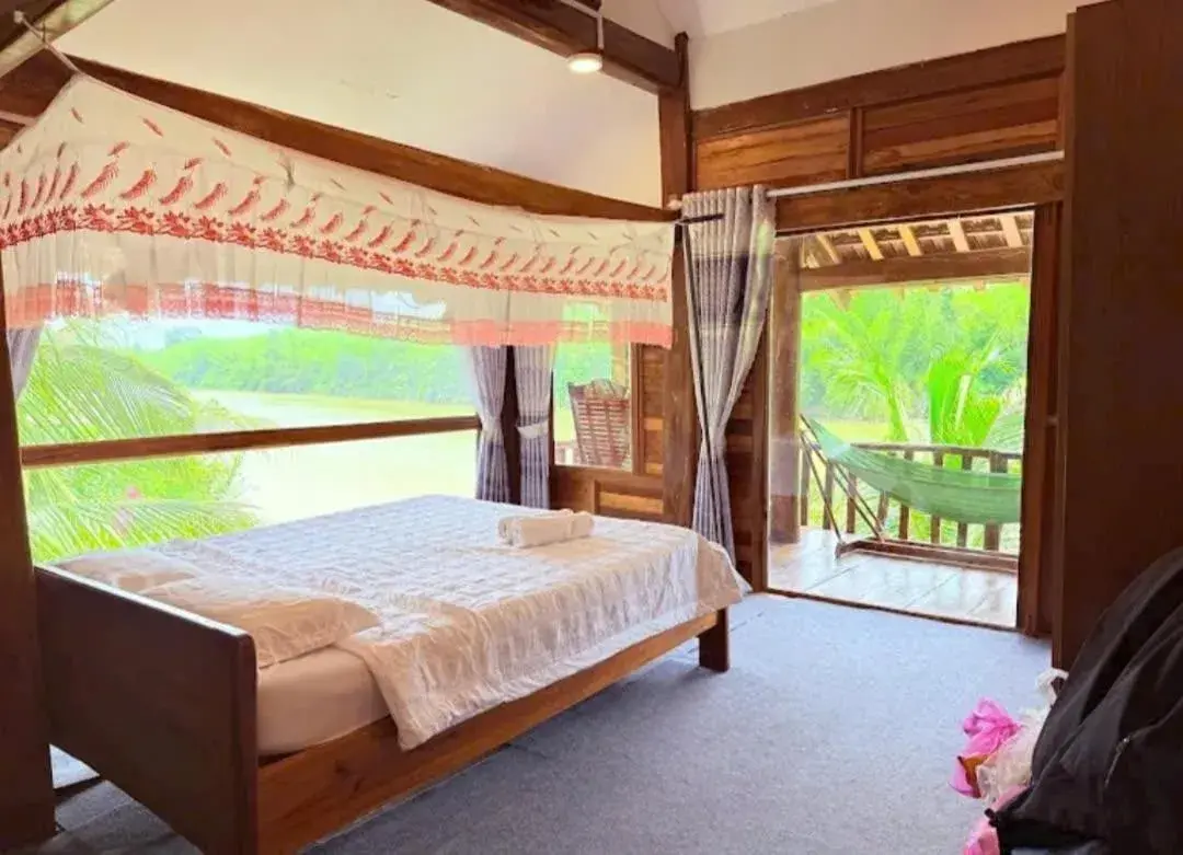 Property building, Bed in Green Bamboo Lodge Resort Property building, Bed in Green Bamboo Lodge Resort