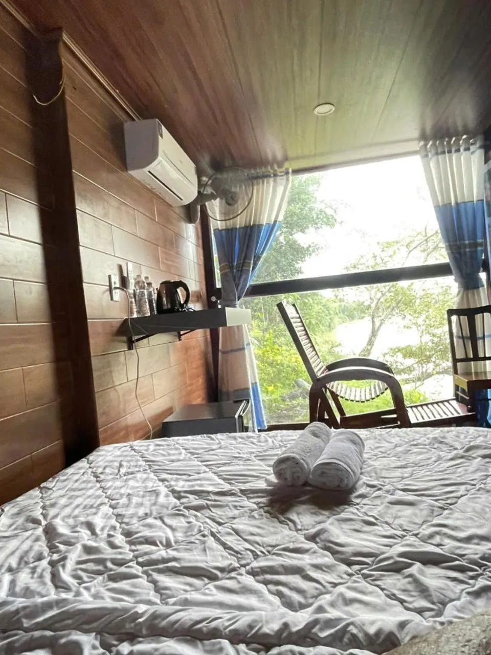 Bed in Green Bamboo Lodge Resort