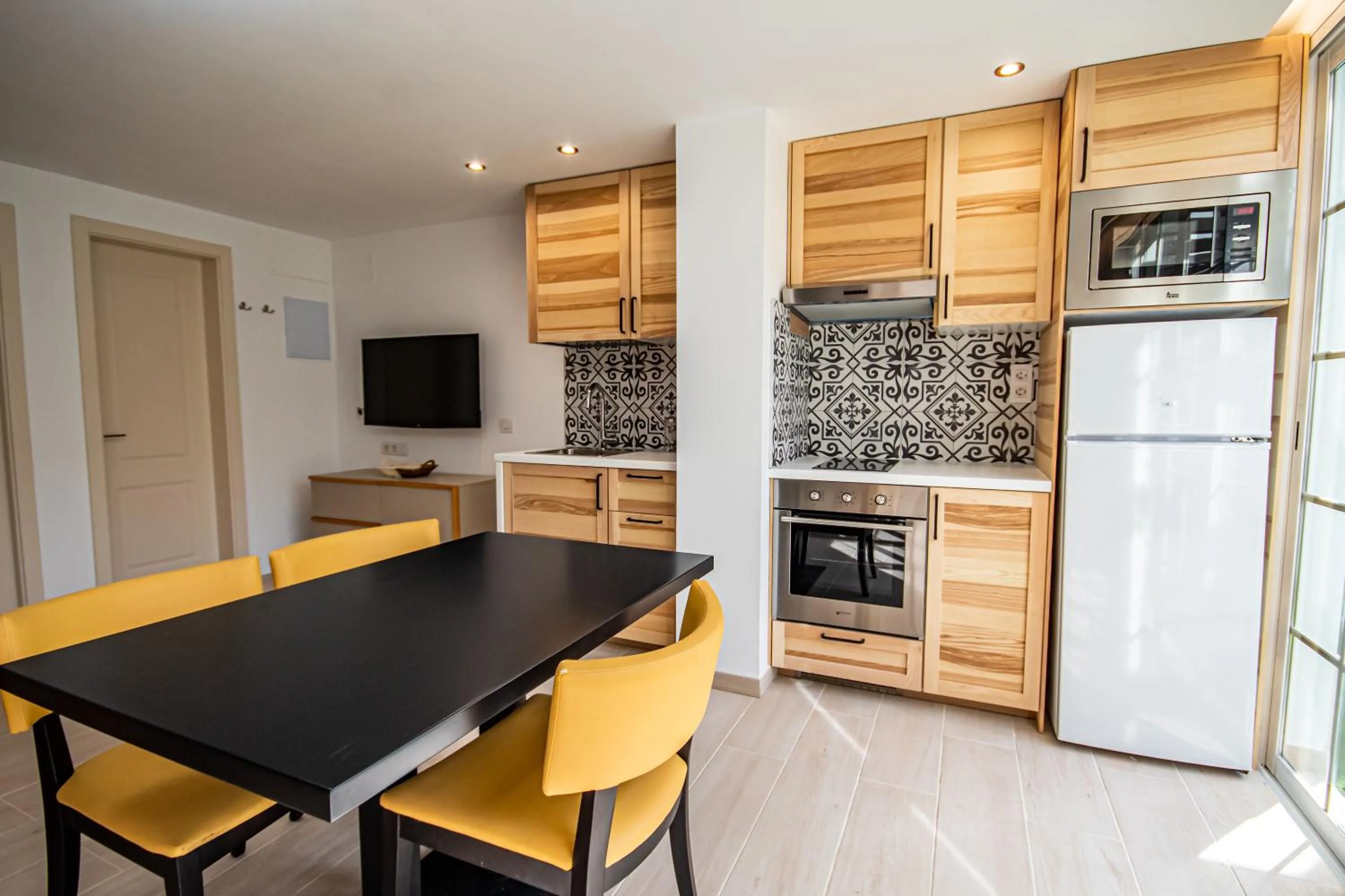 Kitchen or kitchenette in Eden Meloneras by TAM Resorts