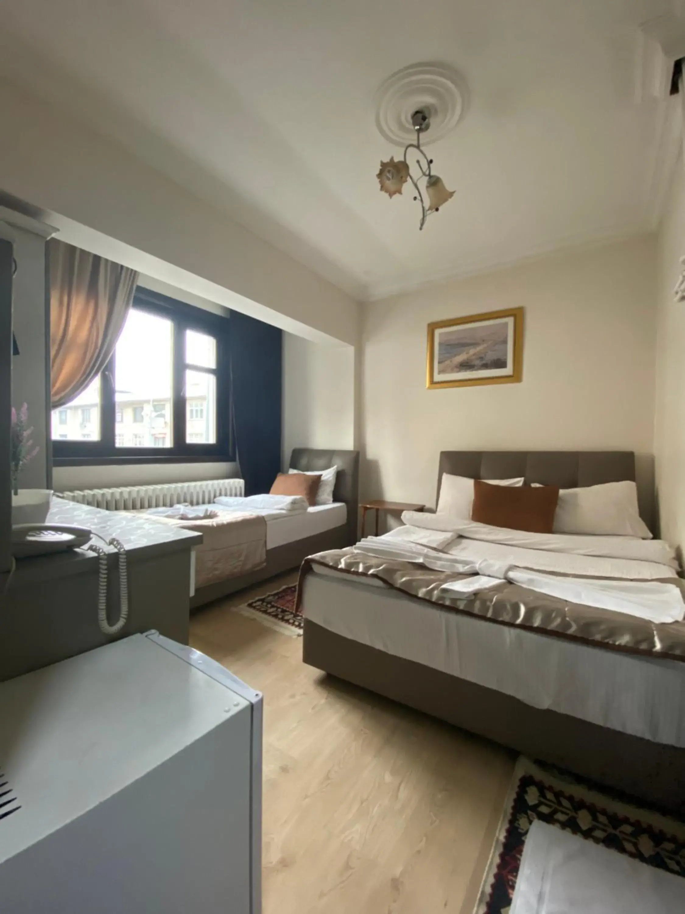 Economy Triple Room in Hotel Kent Ani Economy Triple Room in Hotel Kent Ani