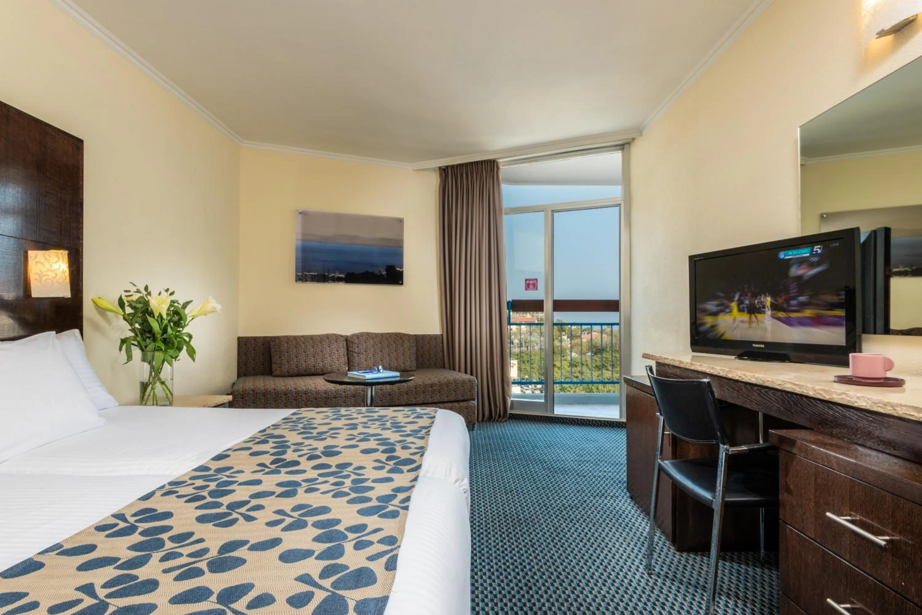 Seating area, Bed in Leonardo Club Tiberias - All Inclusive