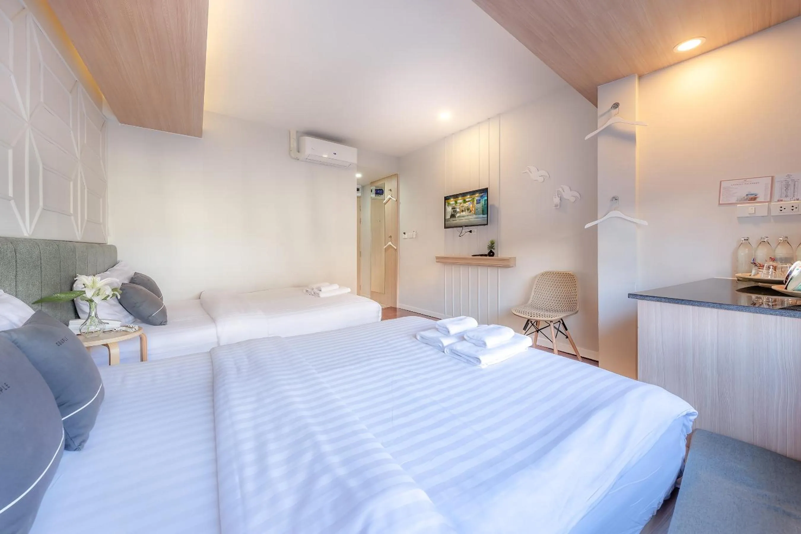 Bed in Tori Prestige Bangkok Hotel