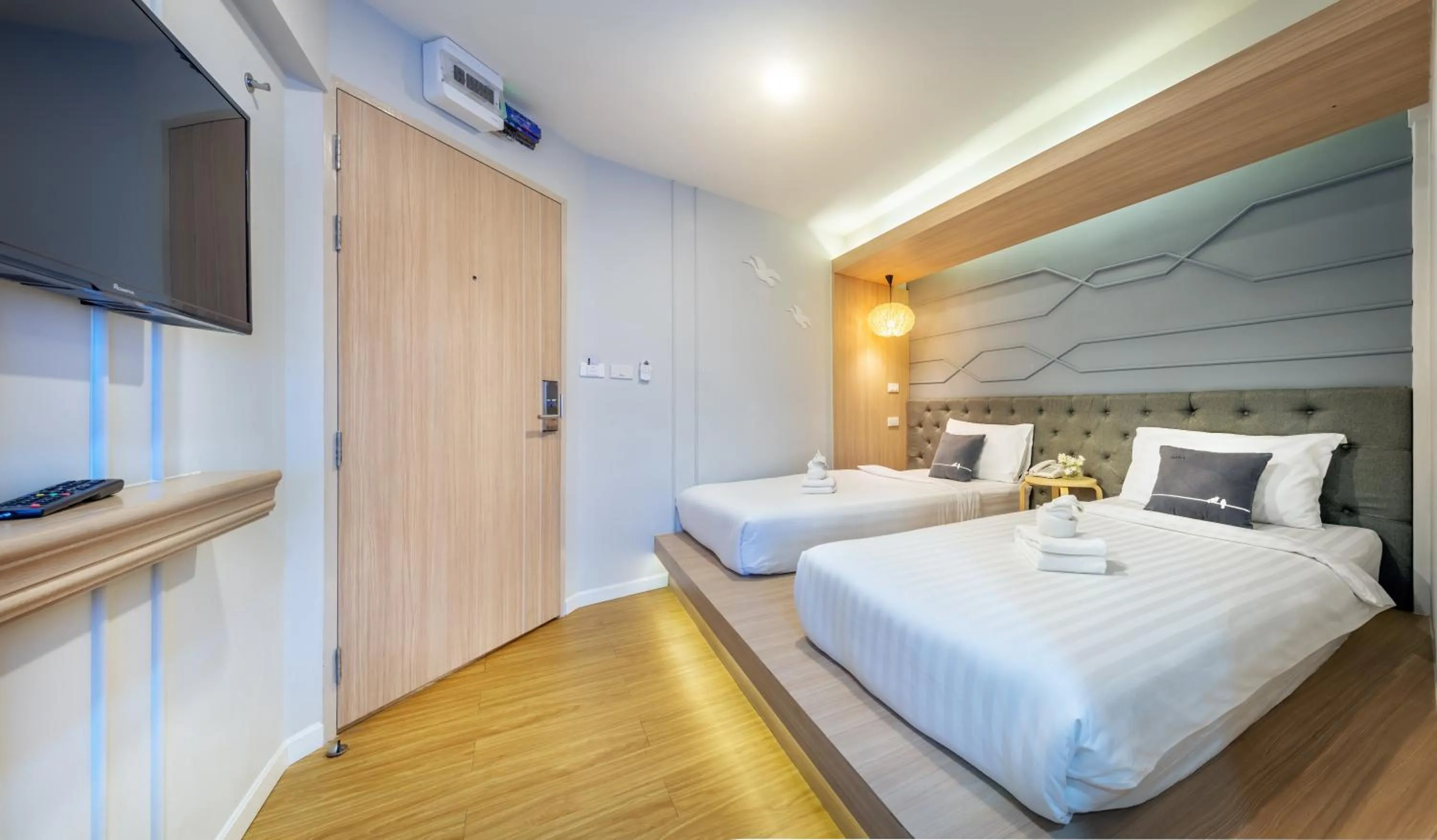 Bed in Tori Prestige Bangkok Hotel